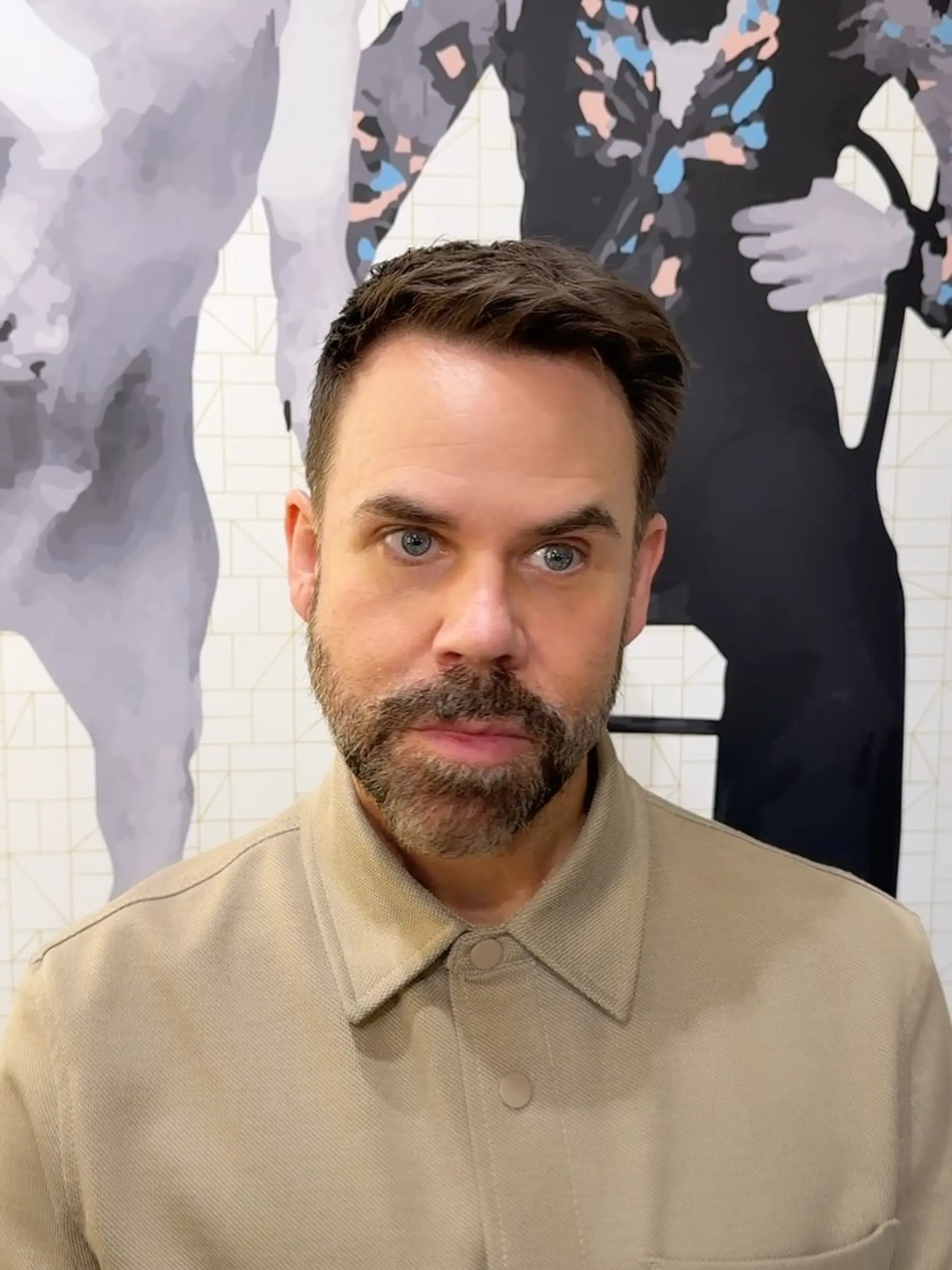 A clean, modern short haircut with slightly longer textured length on top and neatly tapered sides. 1