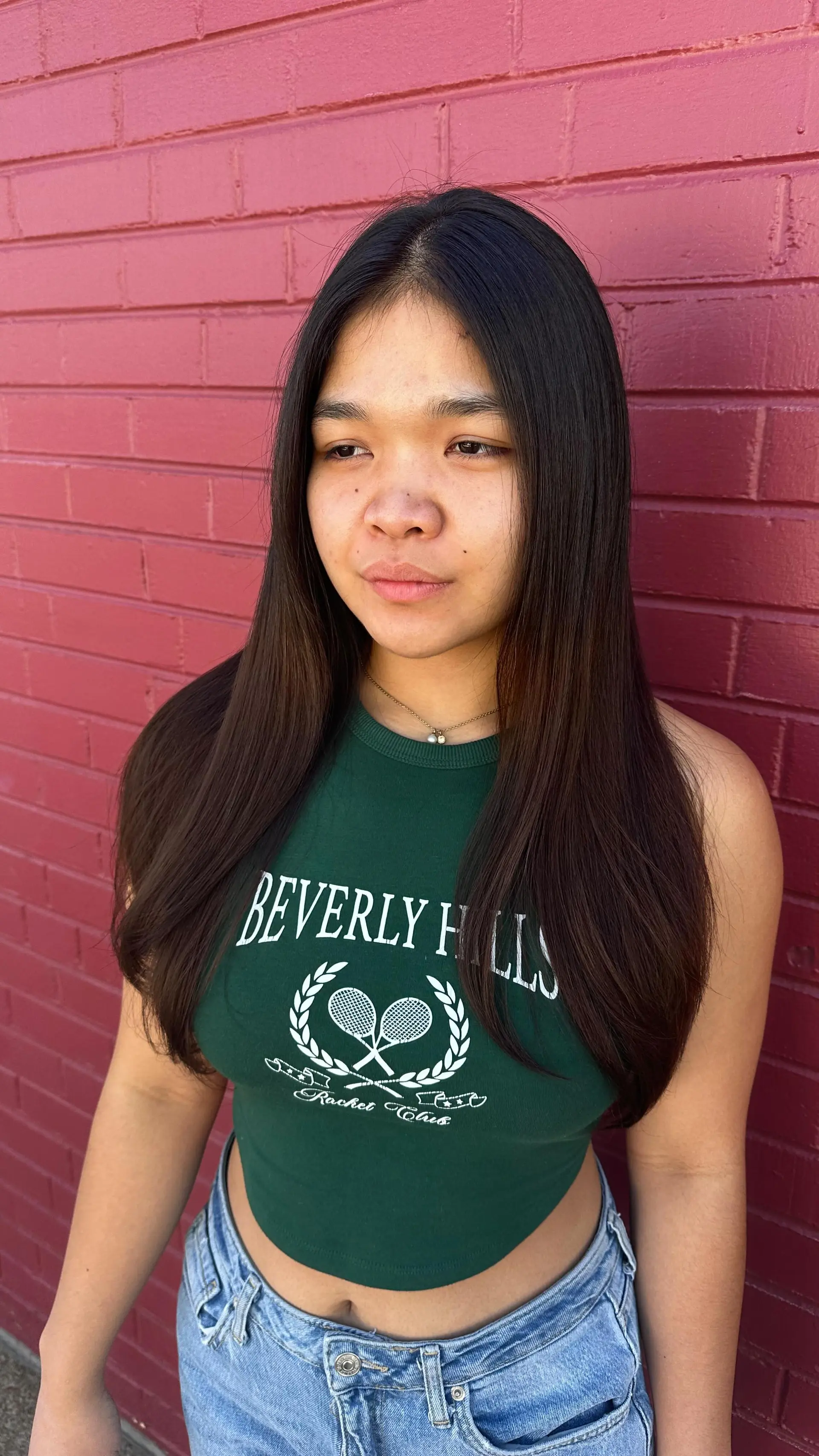 Long, dark straight hair with subtle face-framing layers and smooth, softly rounded ends. 1