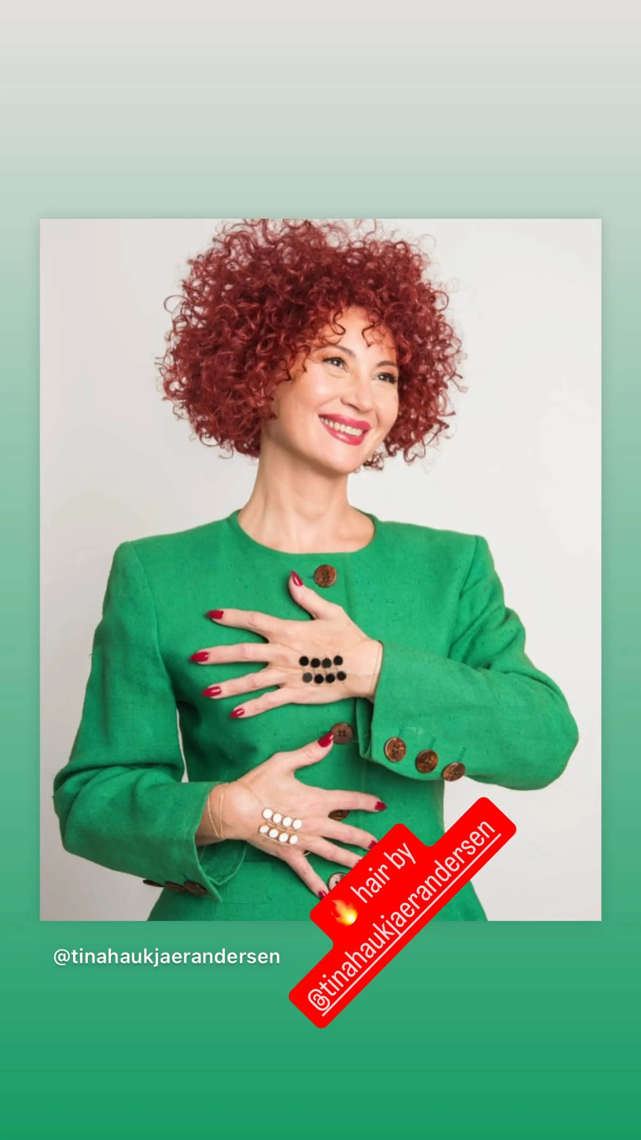 A short curly bob with voluminous, defined curls.