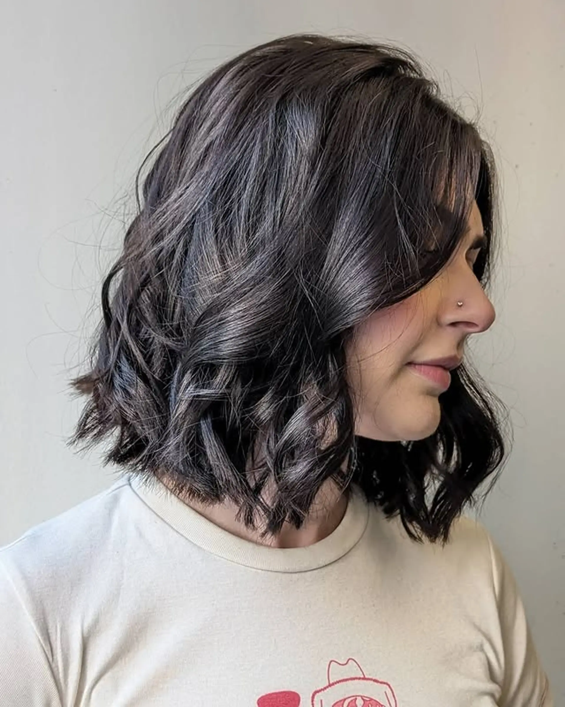 A wavy lob with face-framing layers. 1