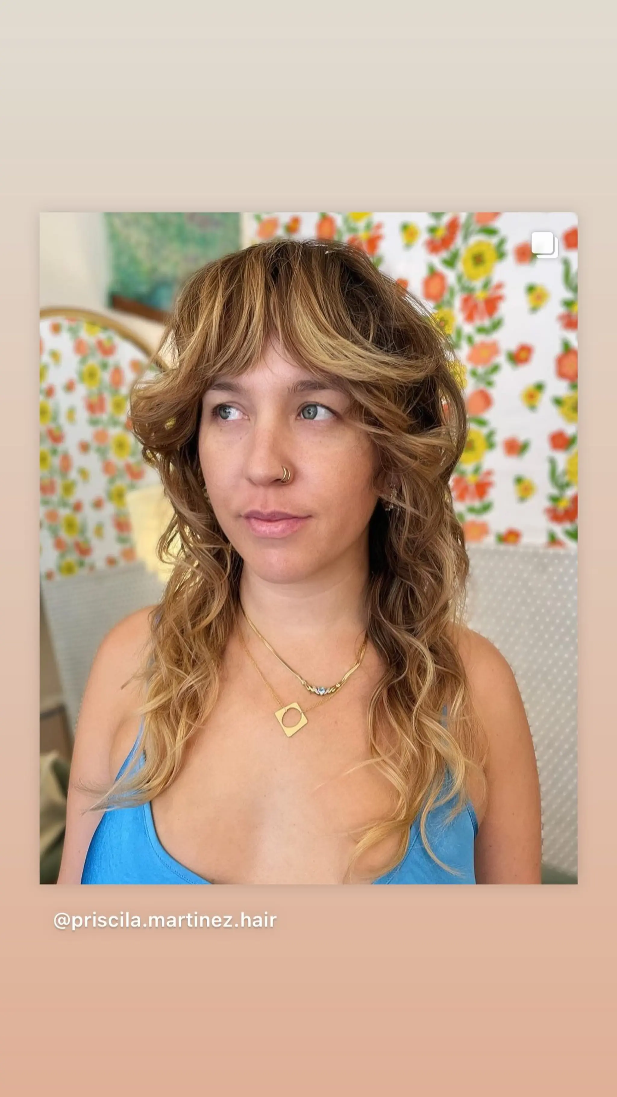 A medium-length shag with face-framing curtain bangs and layered texture.