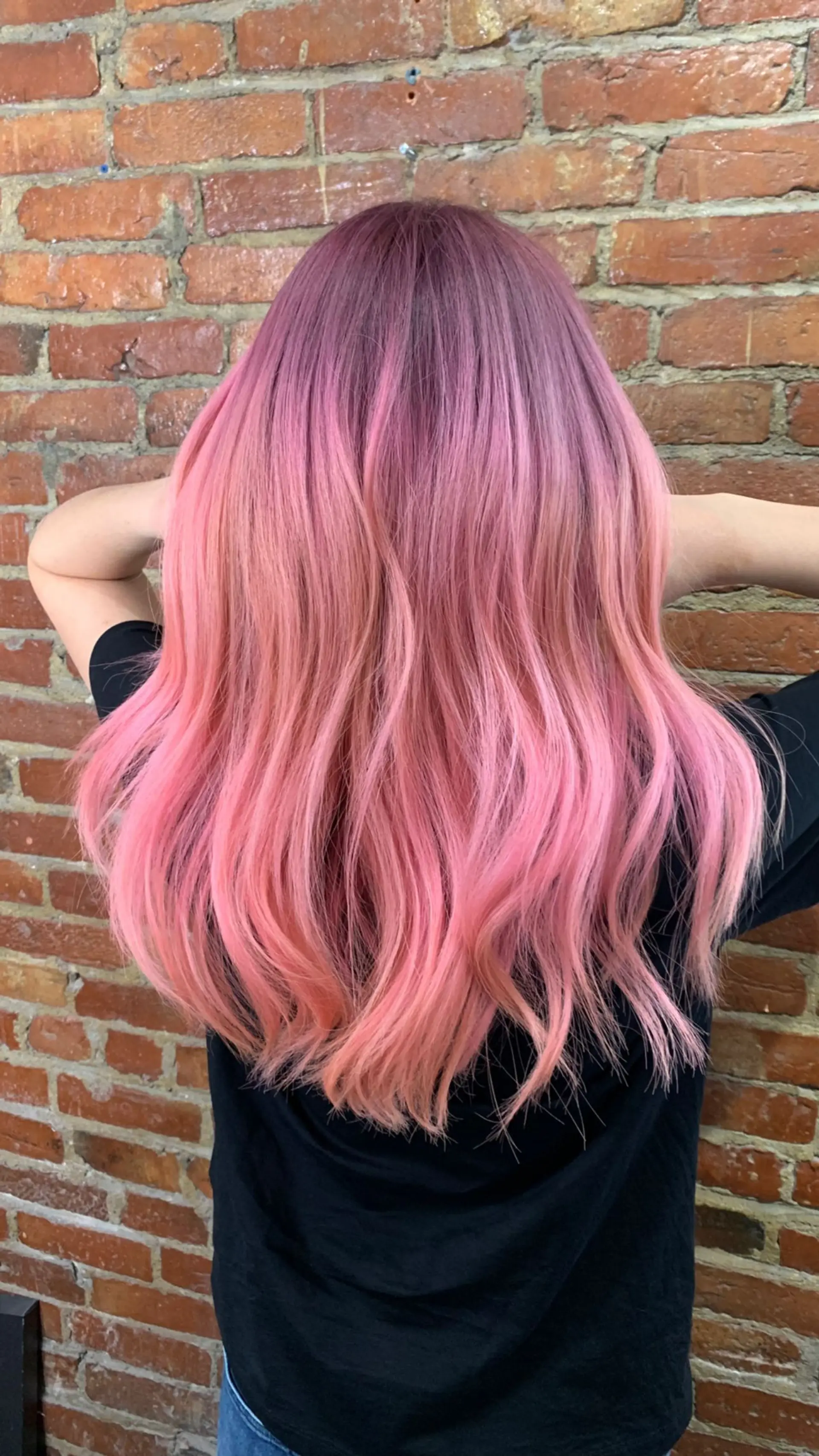 Long, wavy hair with a vibrant color melt balayage. 1