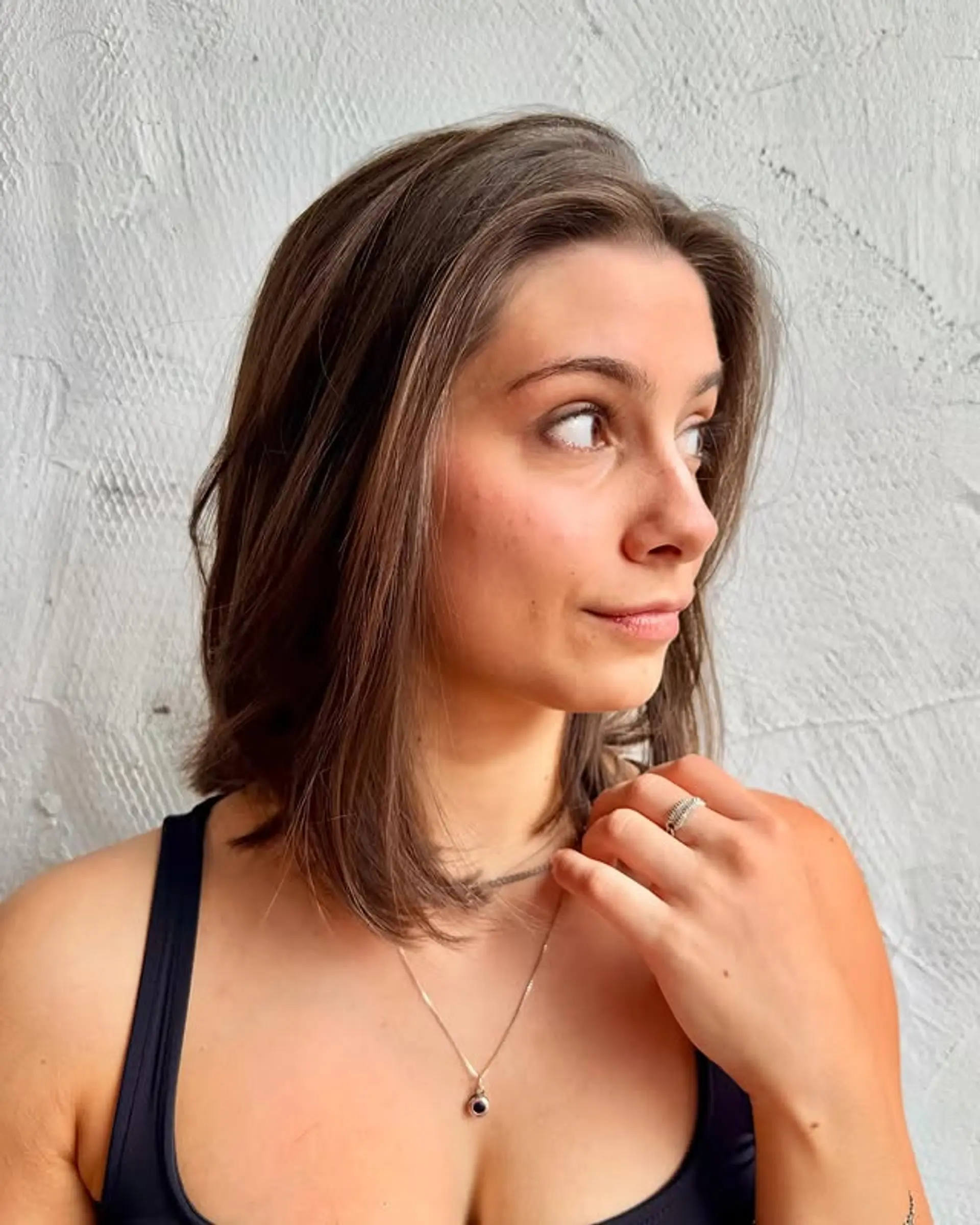 A classic bob haircut with soft, subtle layers for added movement and a flattering shape. 1