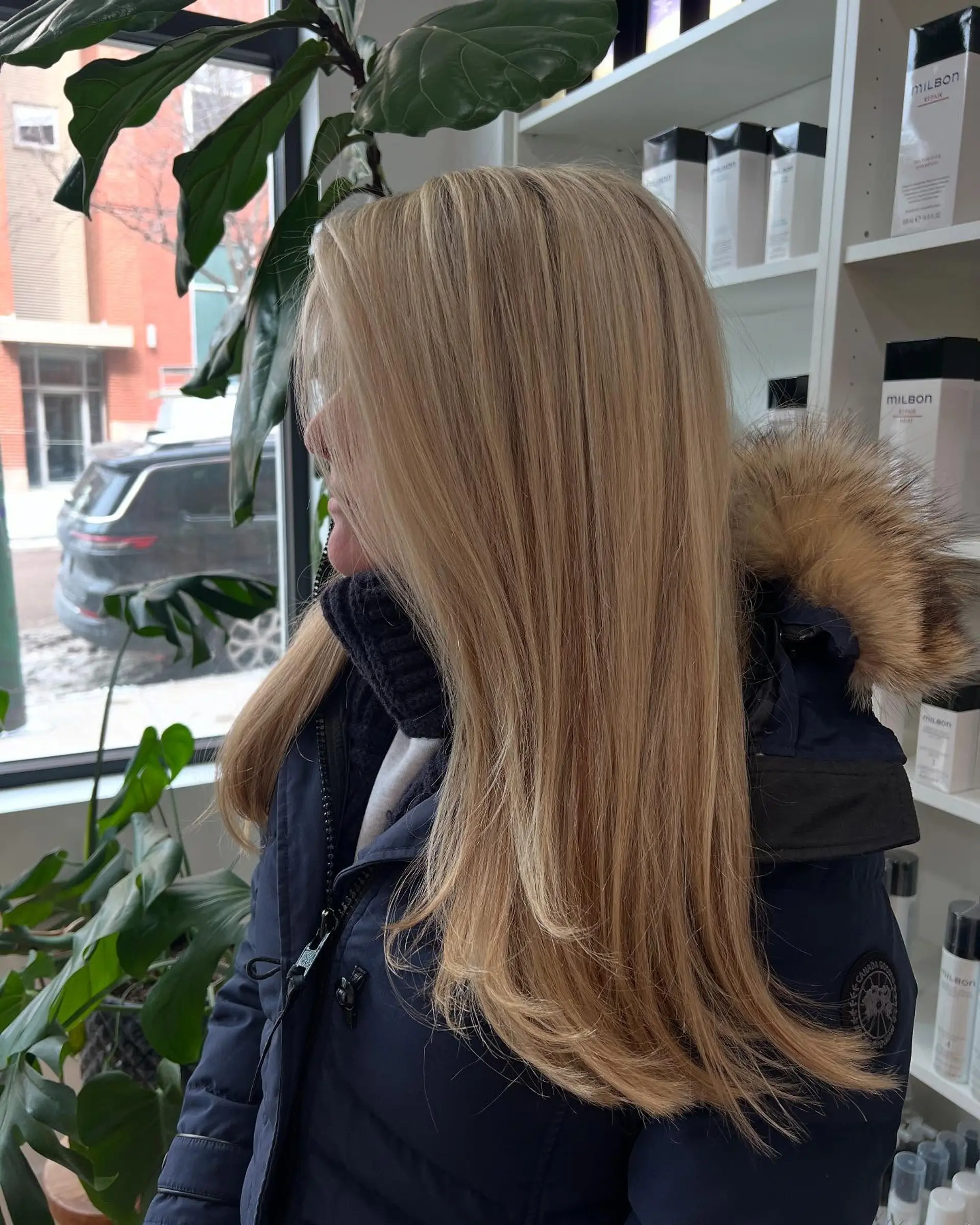Long straight winter blonde hair featuring fine multi-tonal highlights and soft face-framing ends. 1