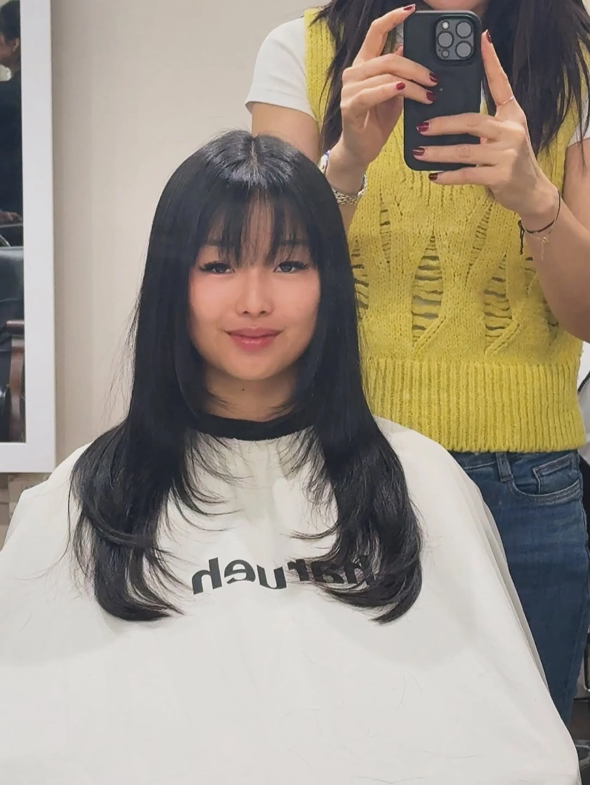 Long layered haircut with soft, face-framing wispy French bangs - Preview 2