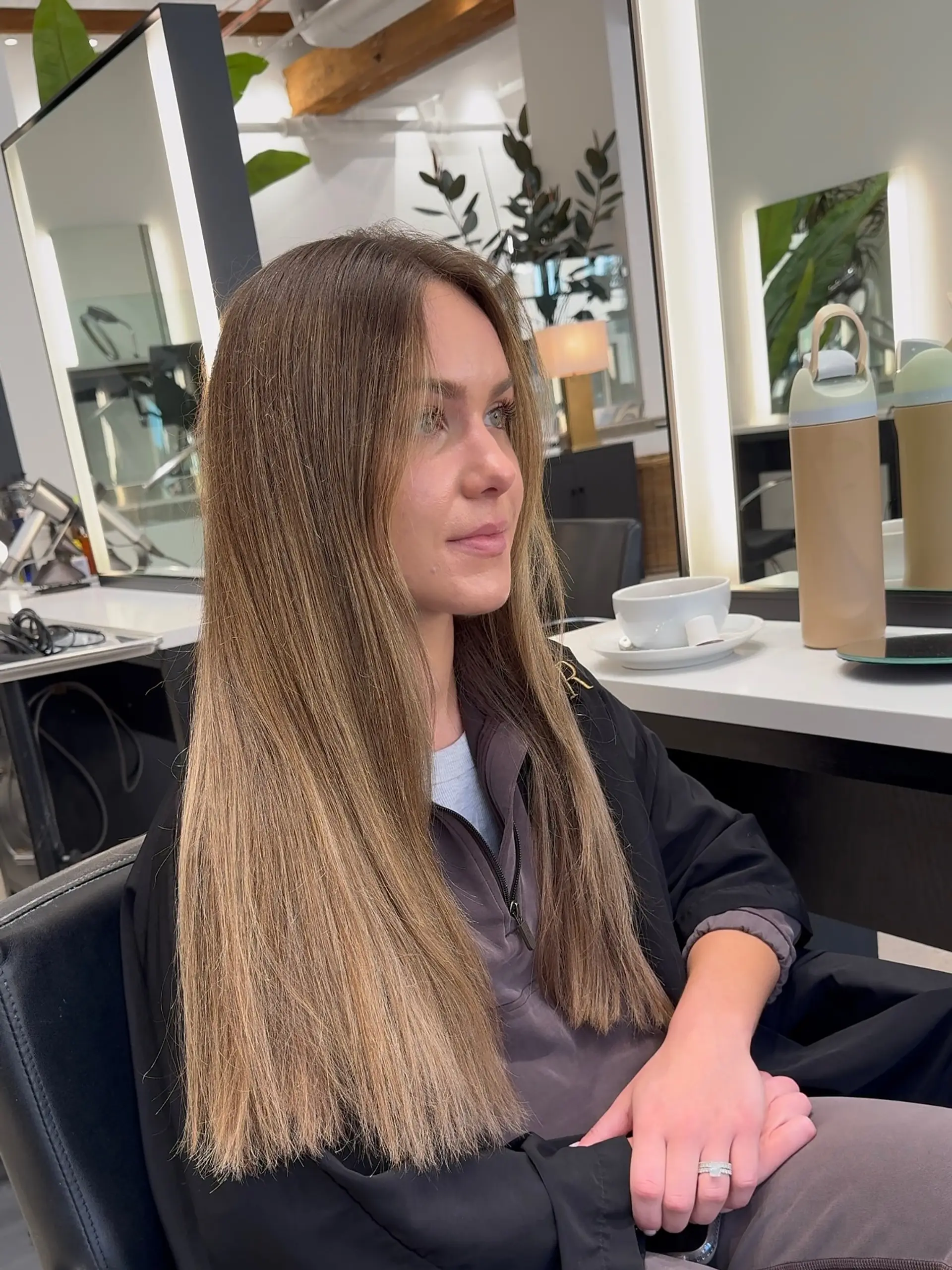 Long, flowing waves with a bronde balayage technique. 2