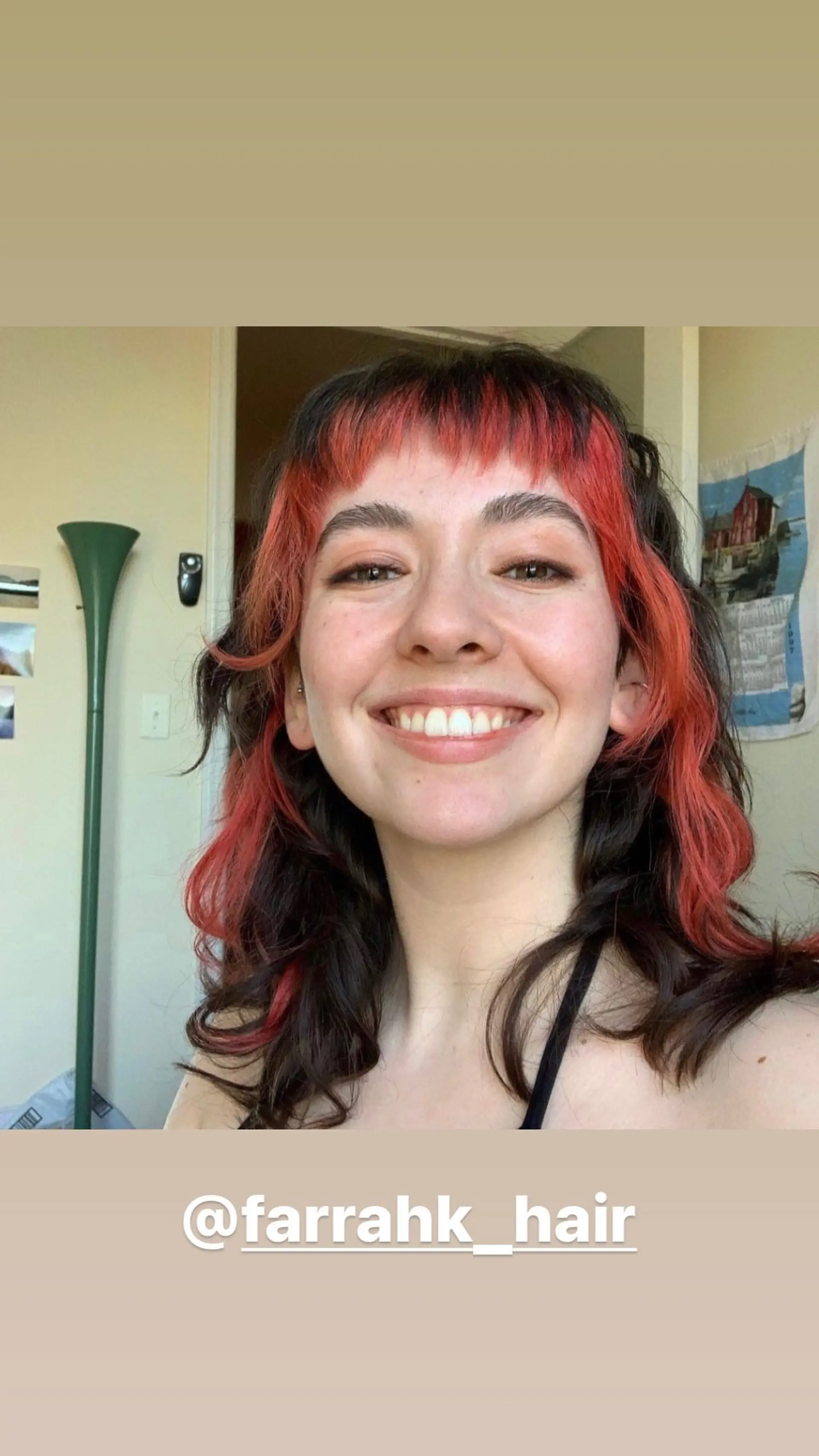 A medium-length shag with red highlights and baby bangs. 1