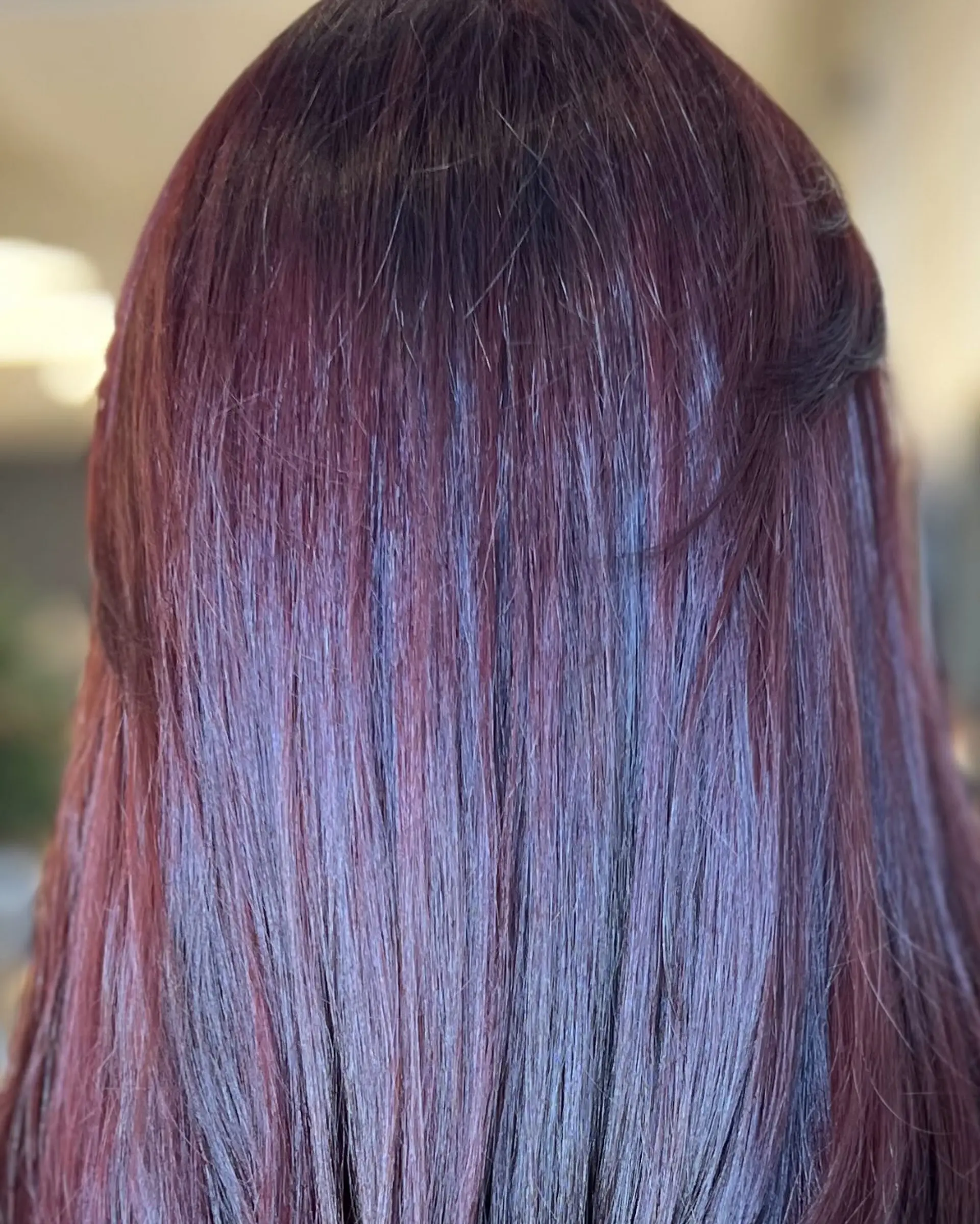 A sleek, straight hairstyle featuring rich burgundy and deep plum tones blended over a dark base. 1
