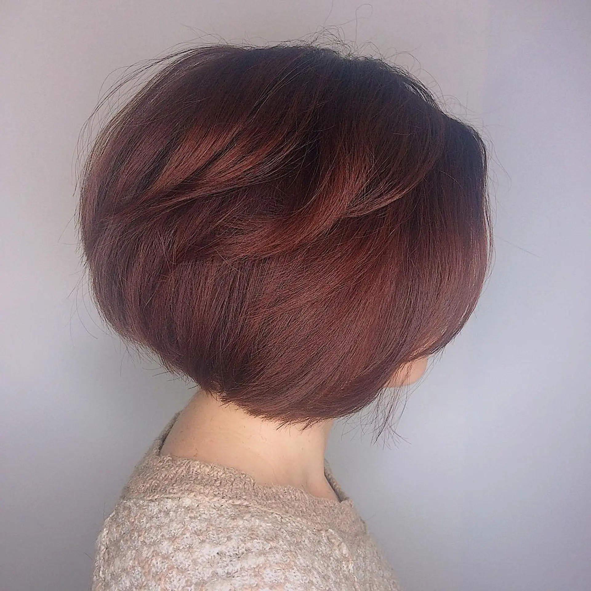 A voluminous, layered bob with stacked layers for added dimension. 1