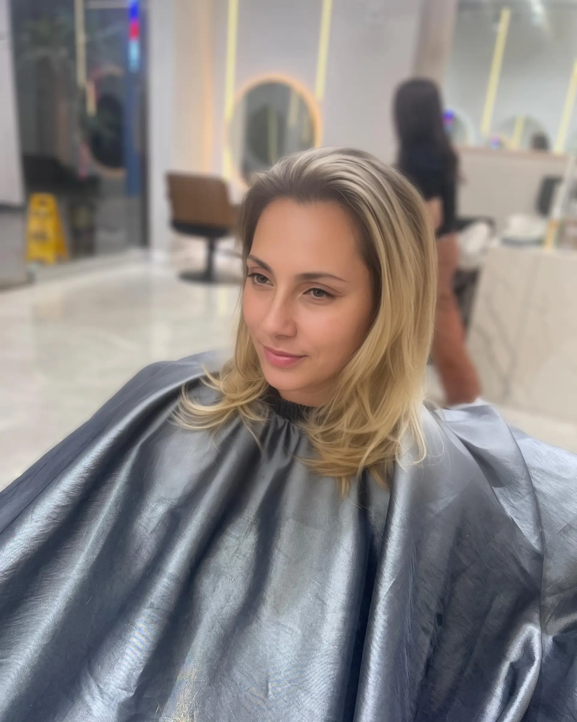 A medium-length layered lob with beachy waves. 1