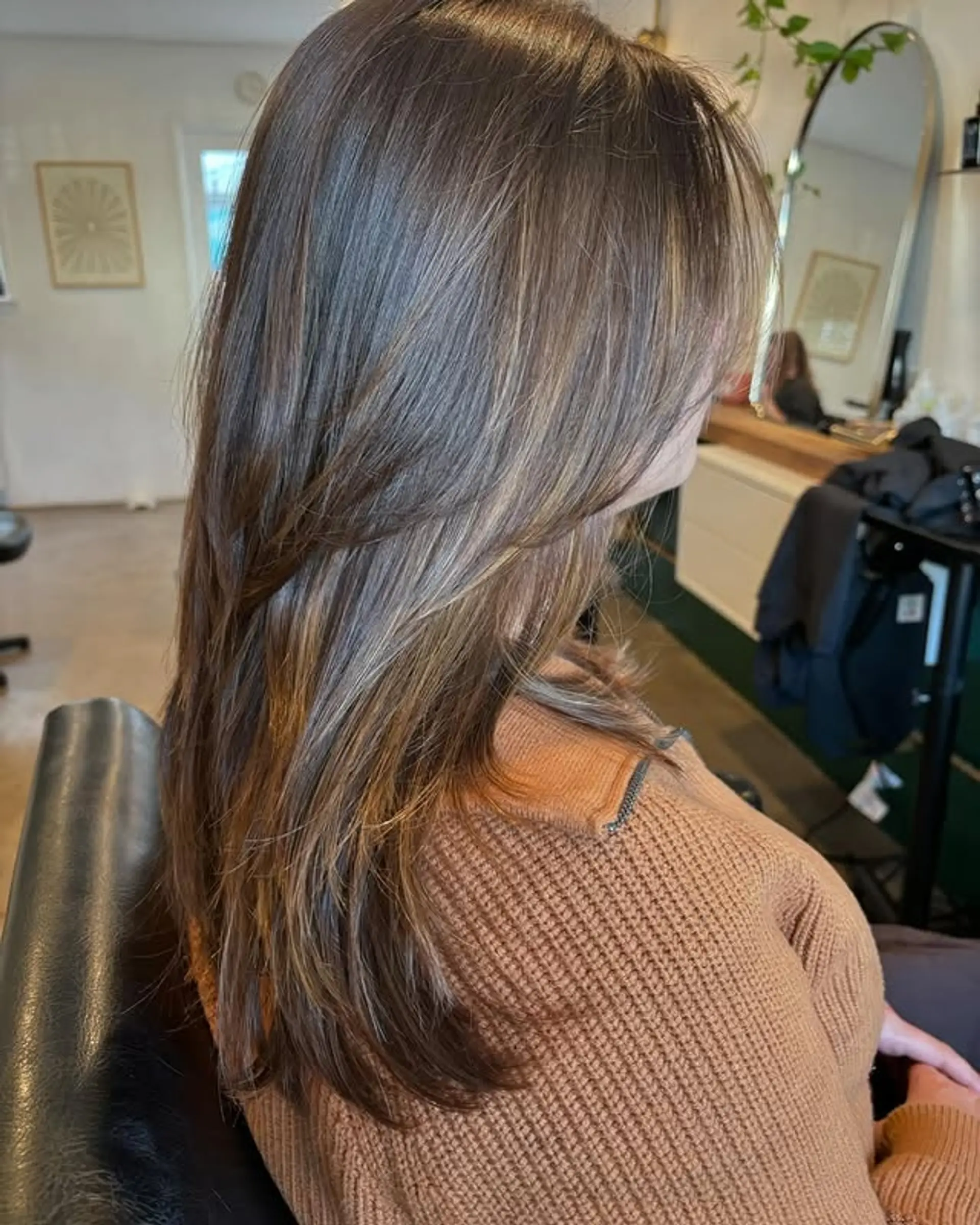 Long layered cut with subtle balayage. 1
