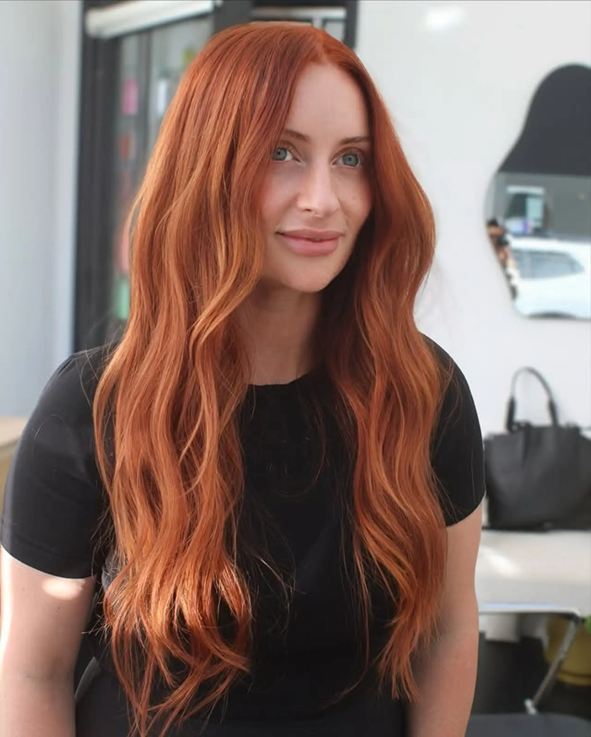 Long wavy hairstyle with a beautiful copper-red color. 1