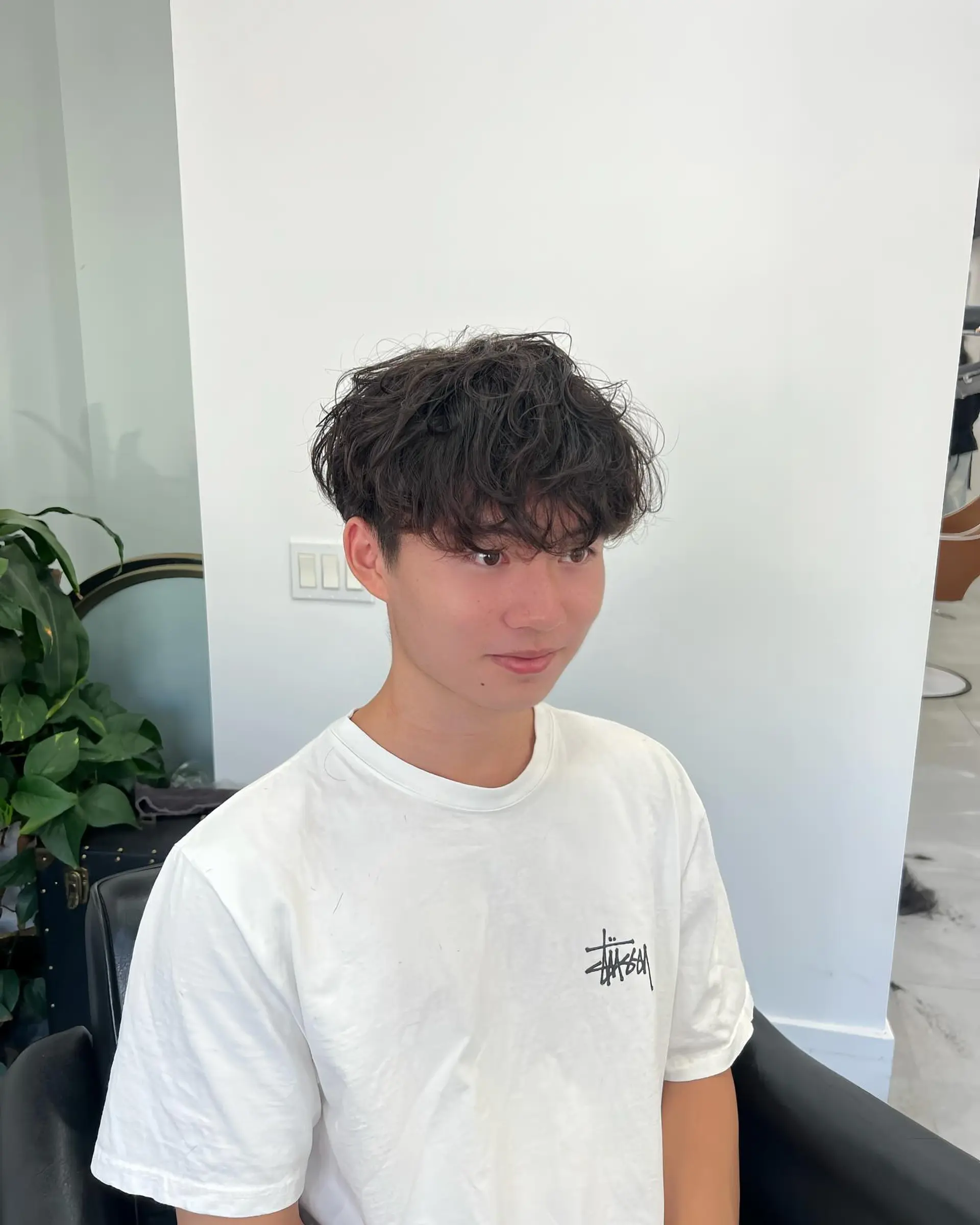 A textured crop with a soft fringe and slightly tapered sides. 1