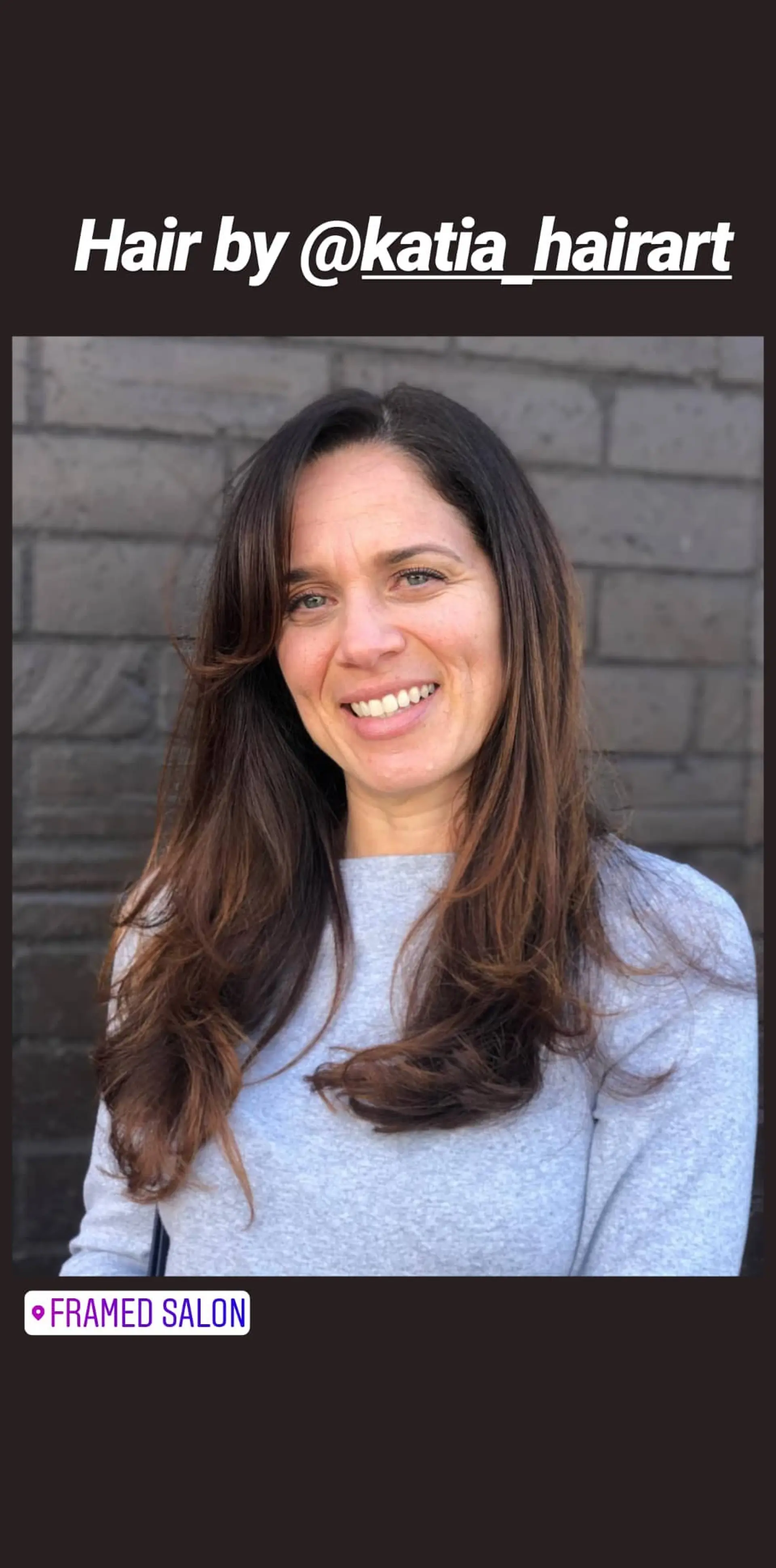 A layered long haircut with face-framing layers, subtle bangs and bronzed highlights. 1