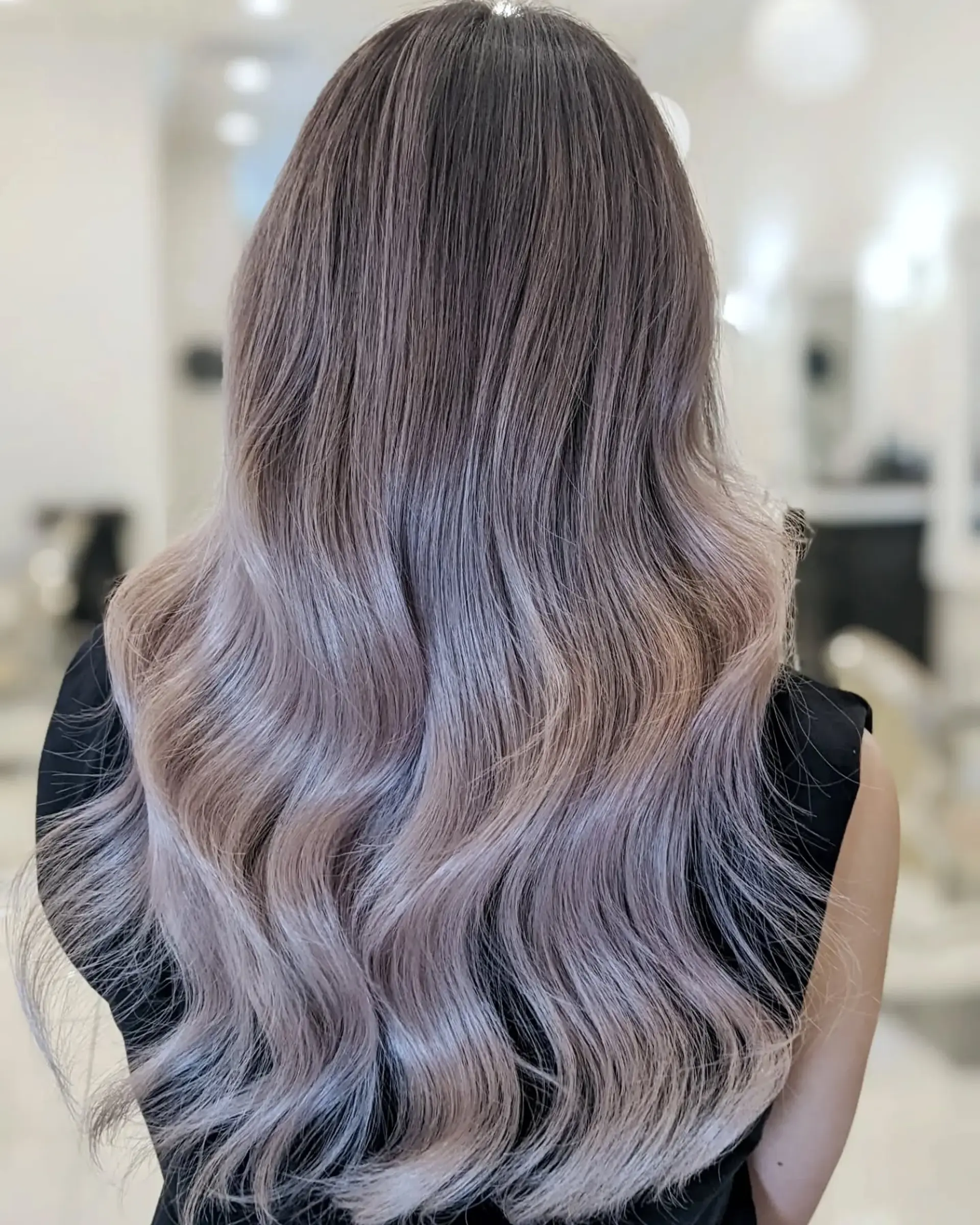 Long, layered waves with a subtle ombre effect. 1