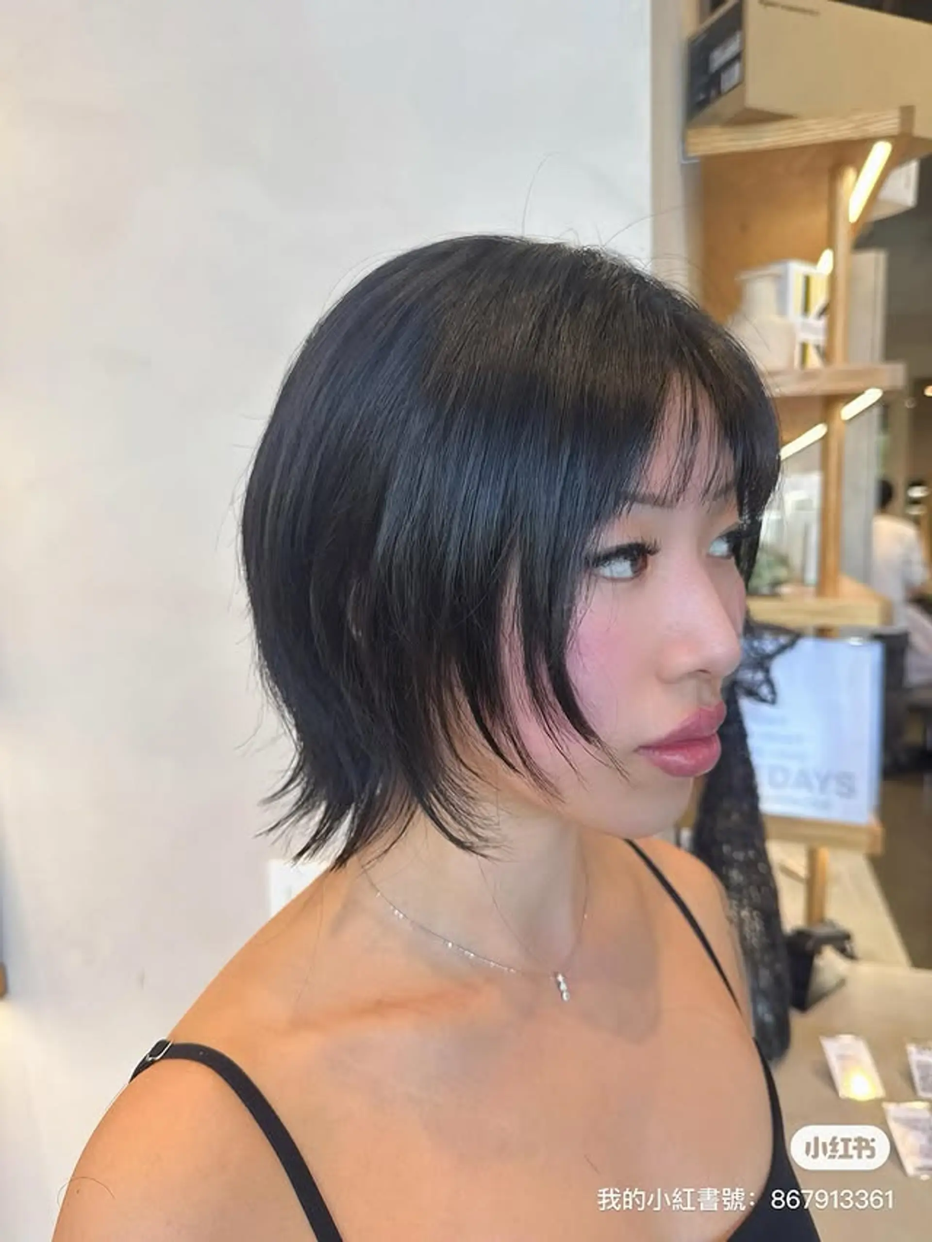 A short, shaggy bob with choppy layers and edgy bangs. 1