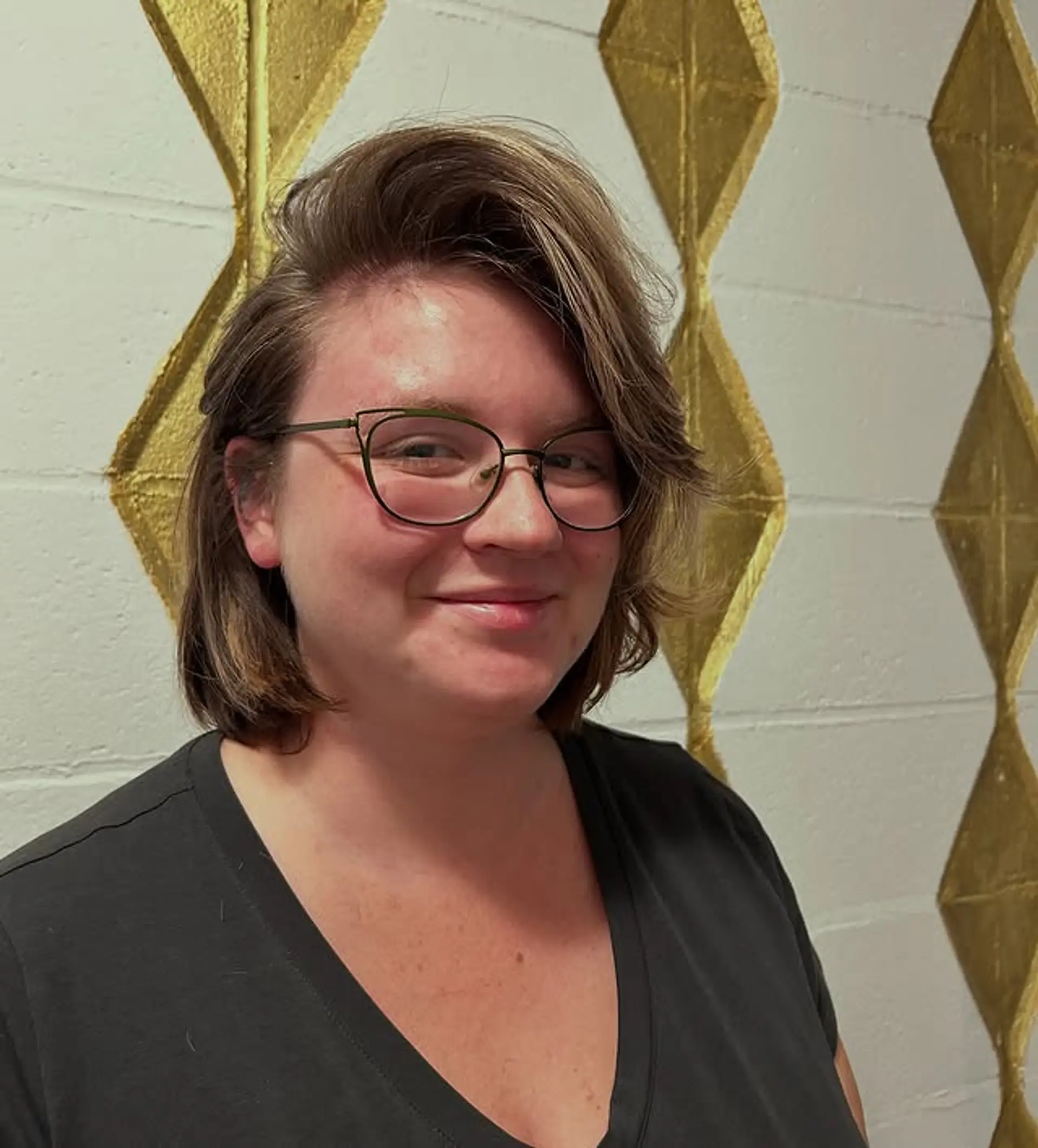 A stylish textured bob with soft waves and face-framing layers. 1