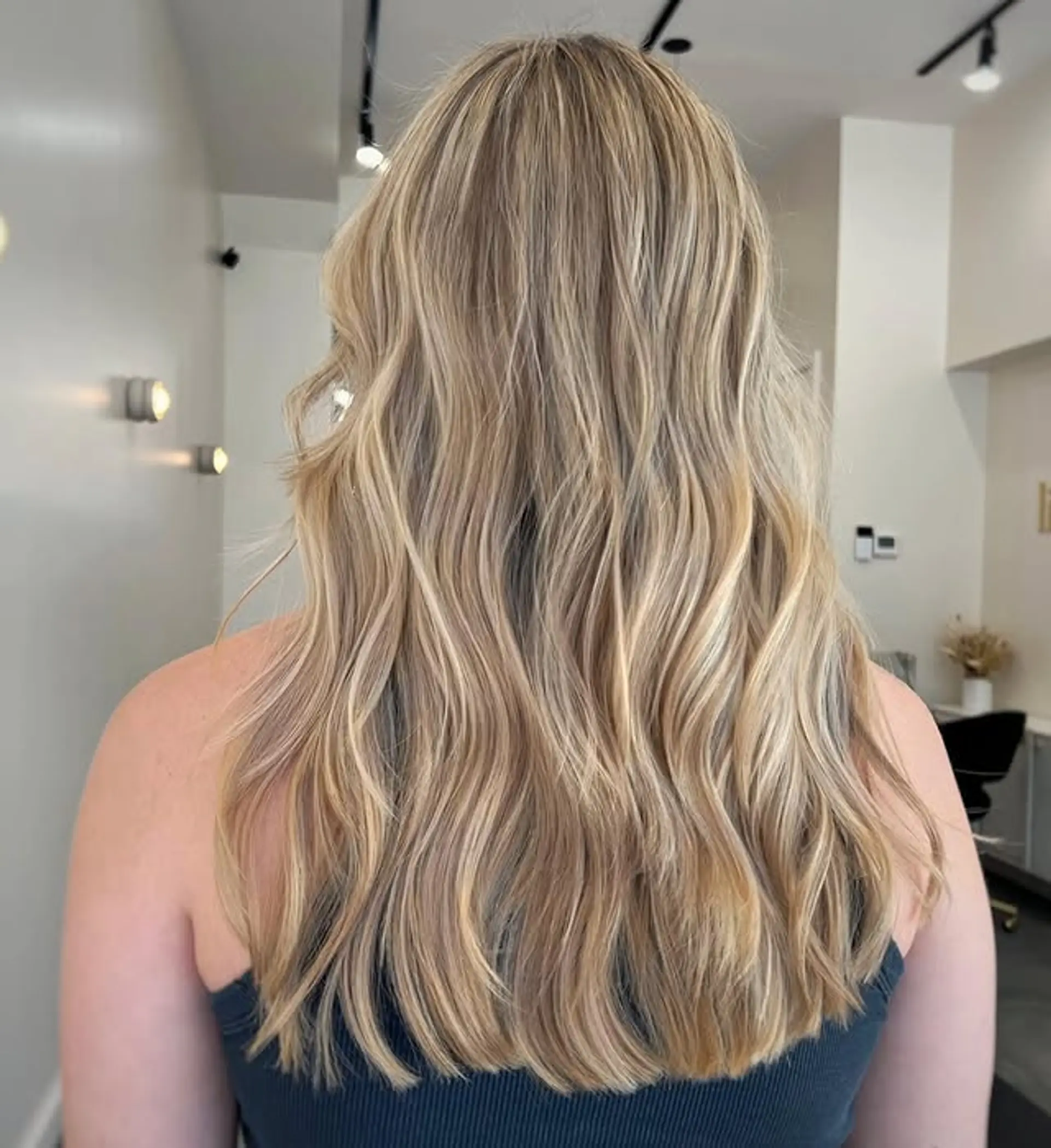Long, wavy, and buttery blonde with a balayage. 1