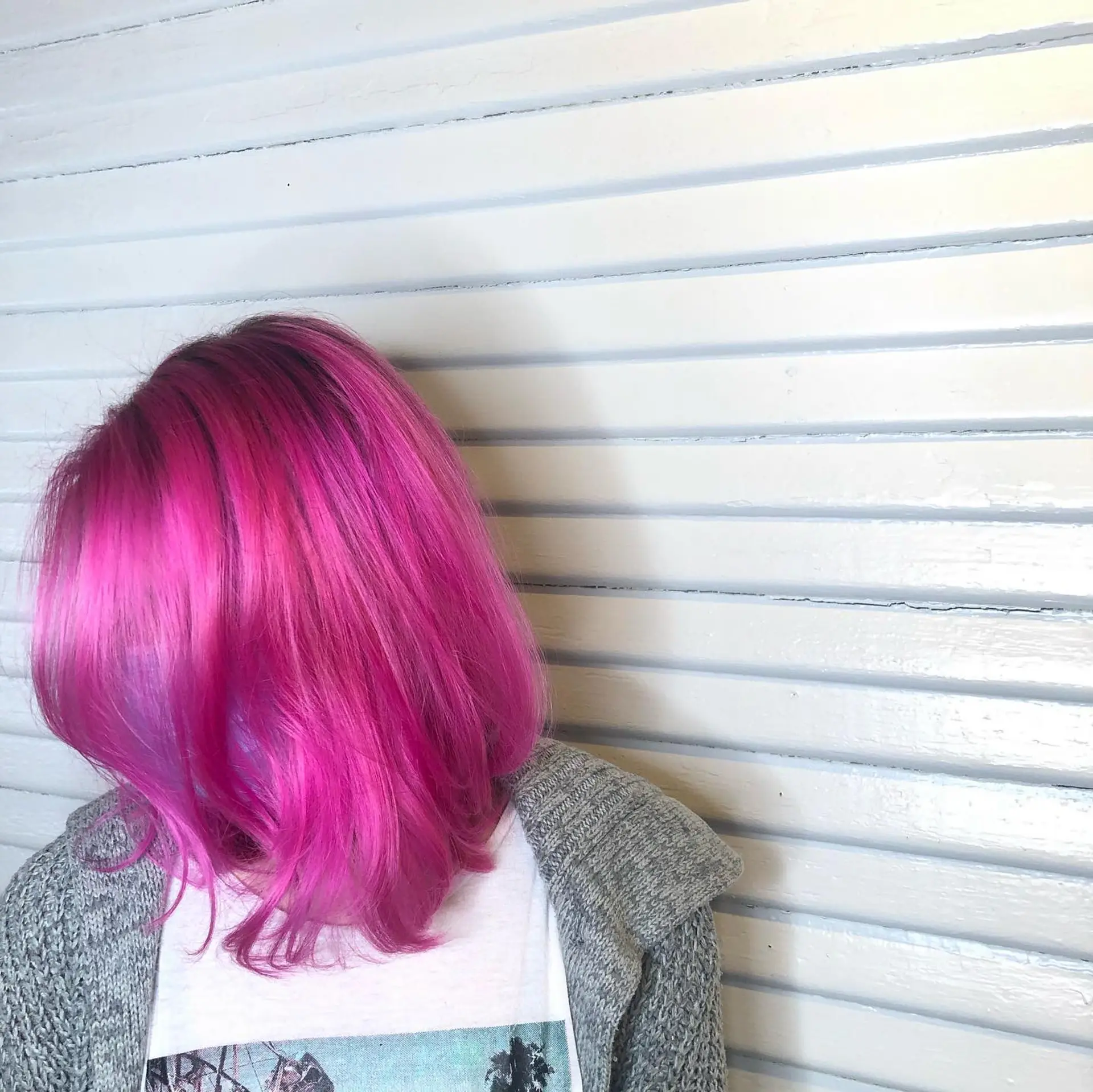 A vibrant, shoulder-length blunt cut colored in a bold shade of magenta and hot pink with subtle movement at the ends. 1