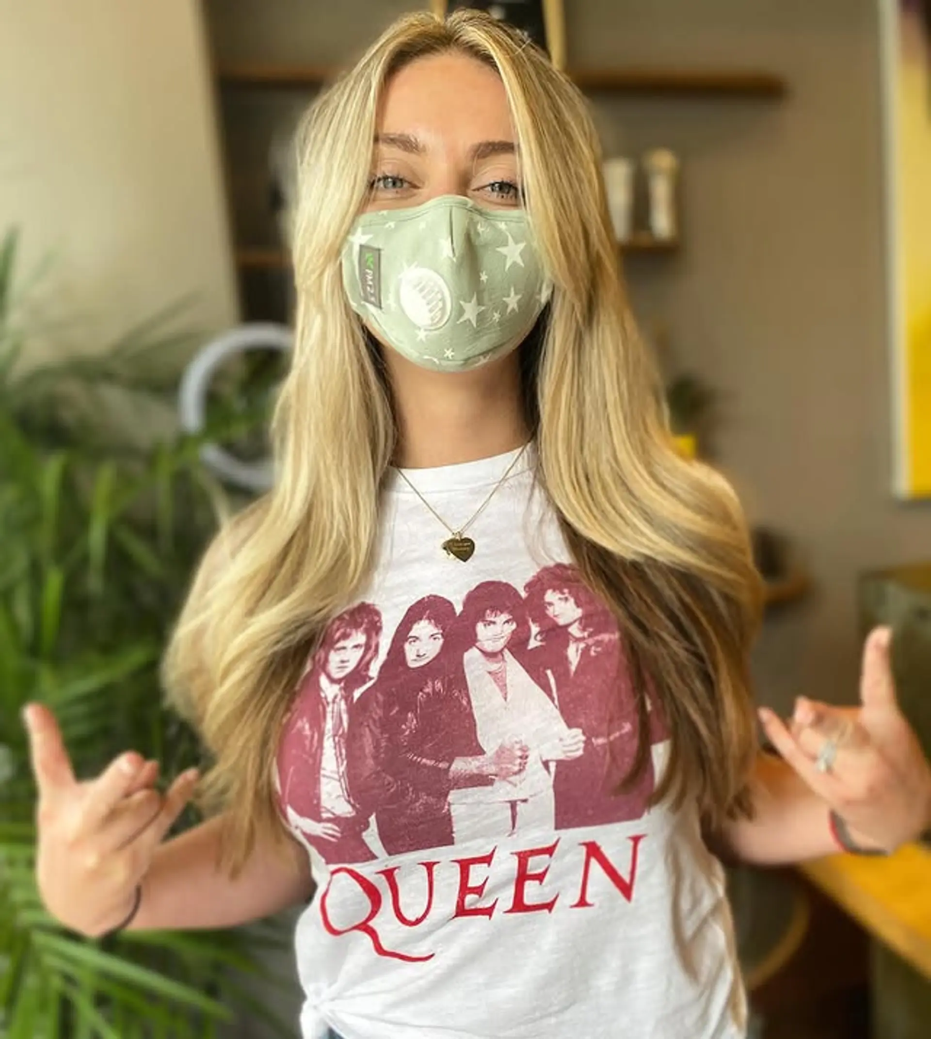 Long, layered hairstyle with curtain bangs and wavy ends. 1