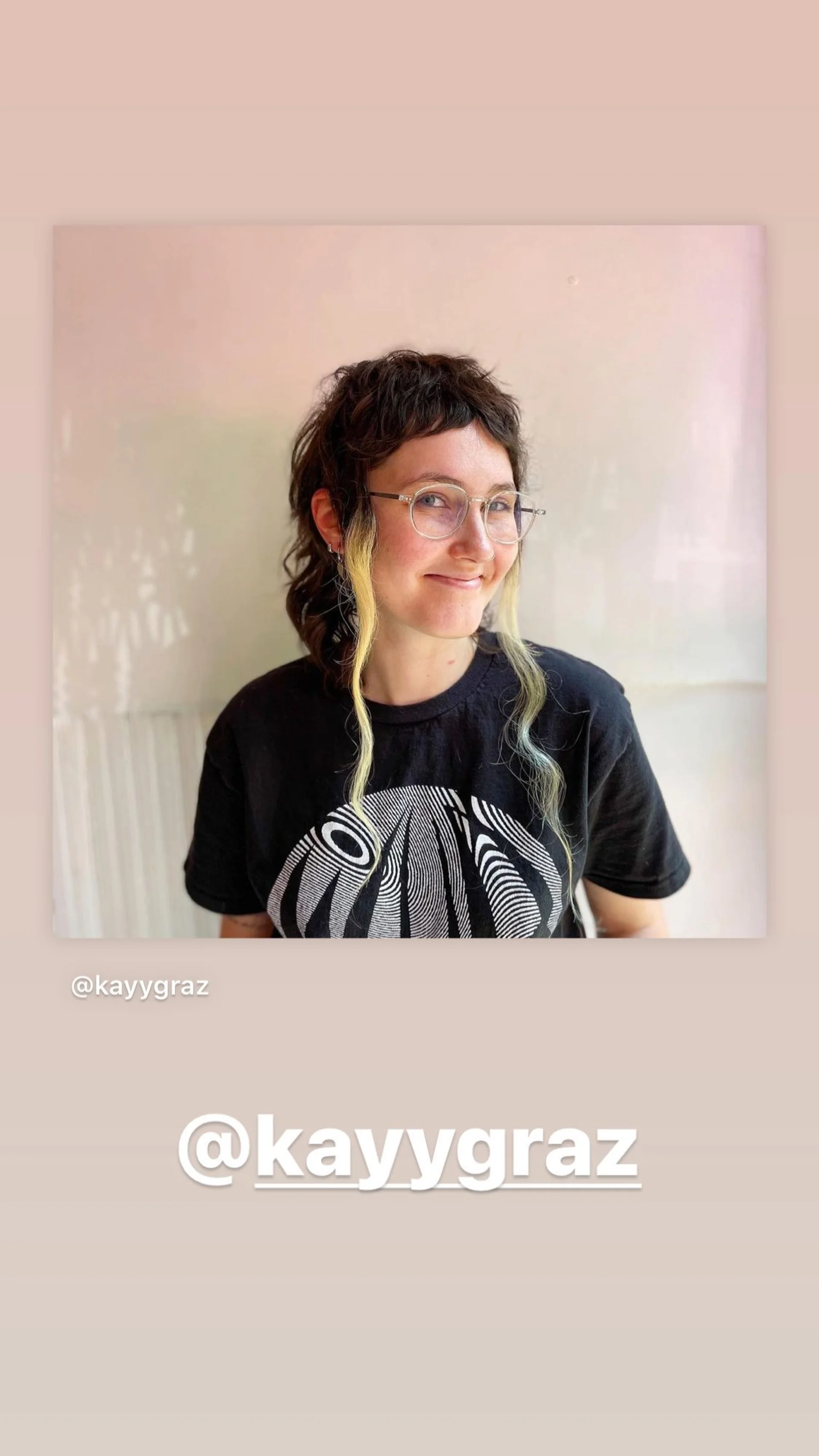 A stylish woman with a short, refined mini mullet haircut with soft fringe bangs, a key 2025 hair trend in NYC. - Preview 3