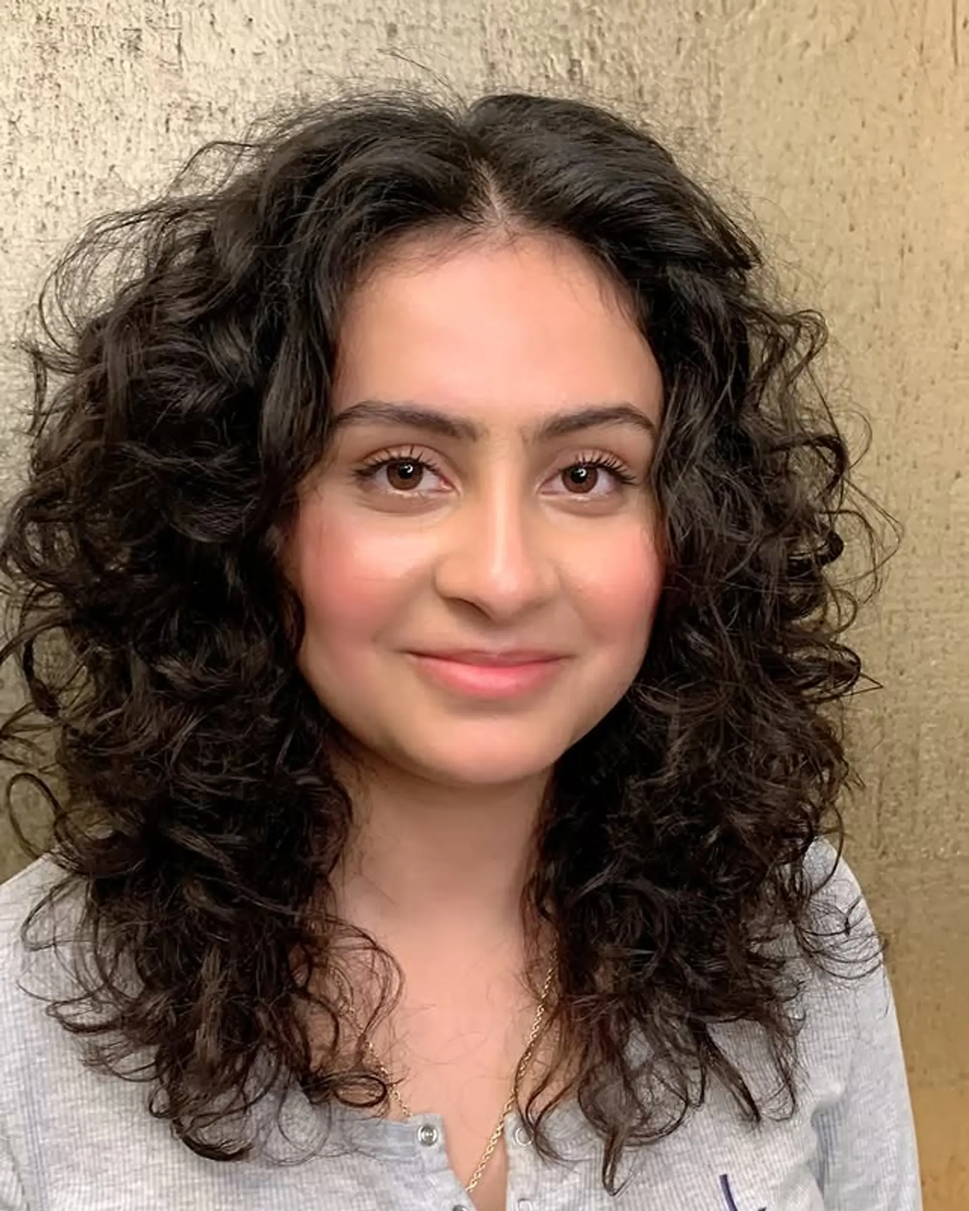 A curly shag with lots of layers to create volume and shape. 1