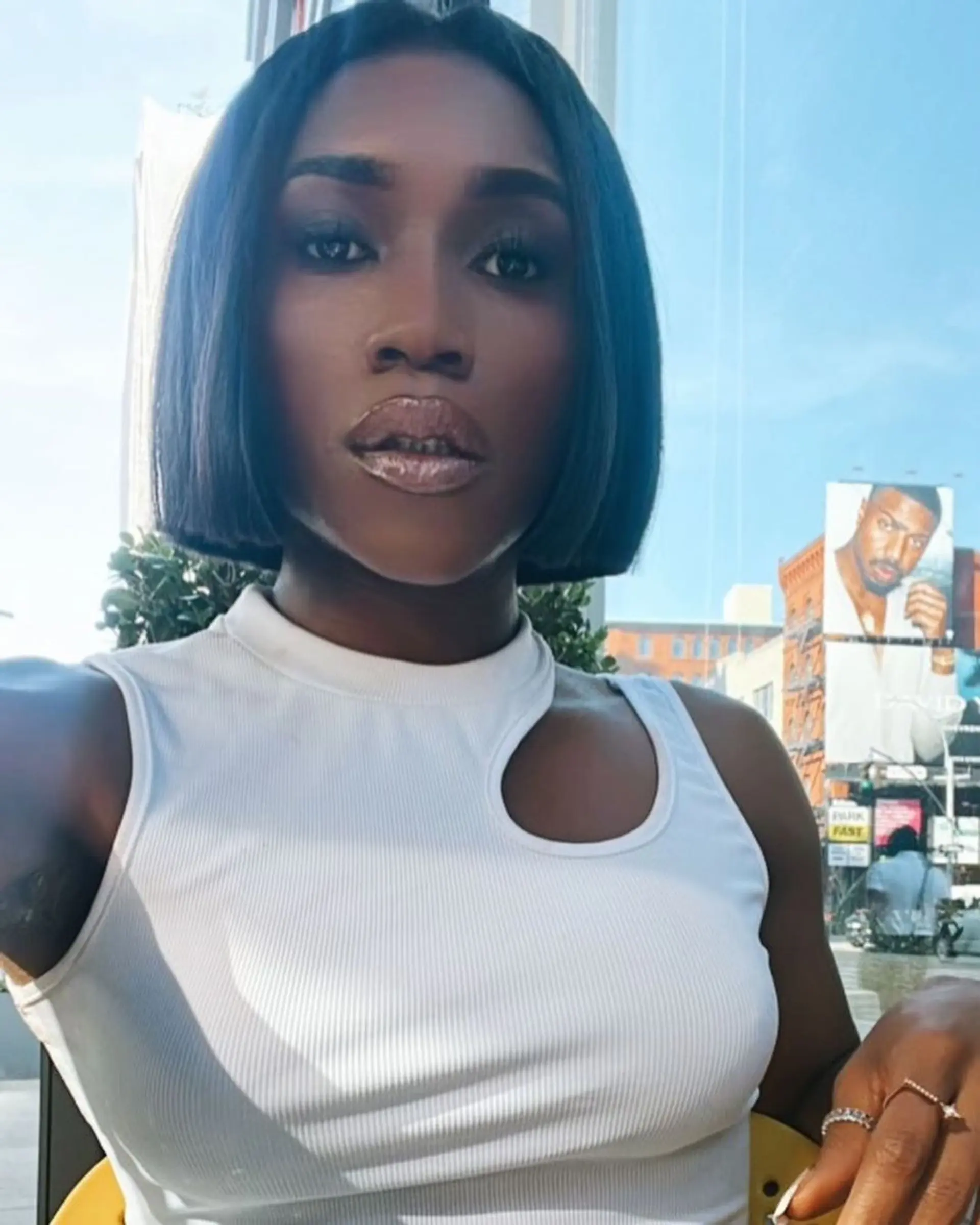 A sleek, blunt-cut bob at chin-length with straight, jet black hair, featuring a glossy, polished finish. Cut by @jamesondakota. Color by @daphdemps 1