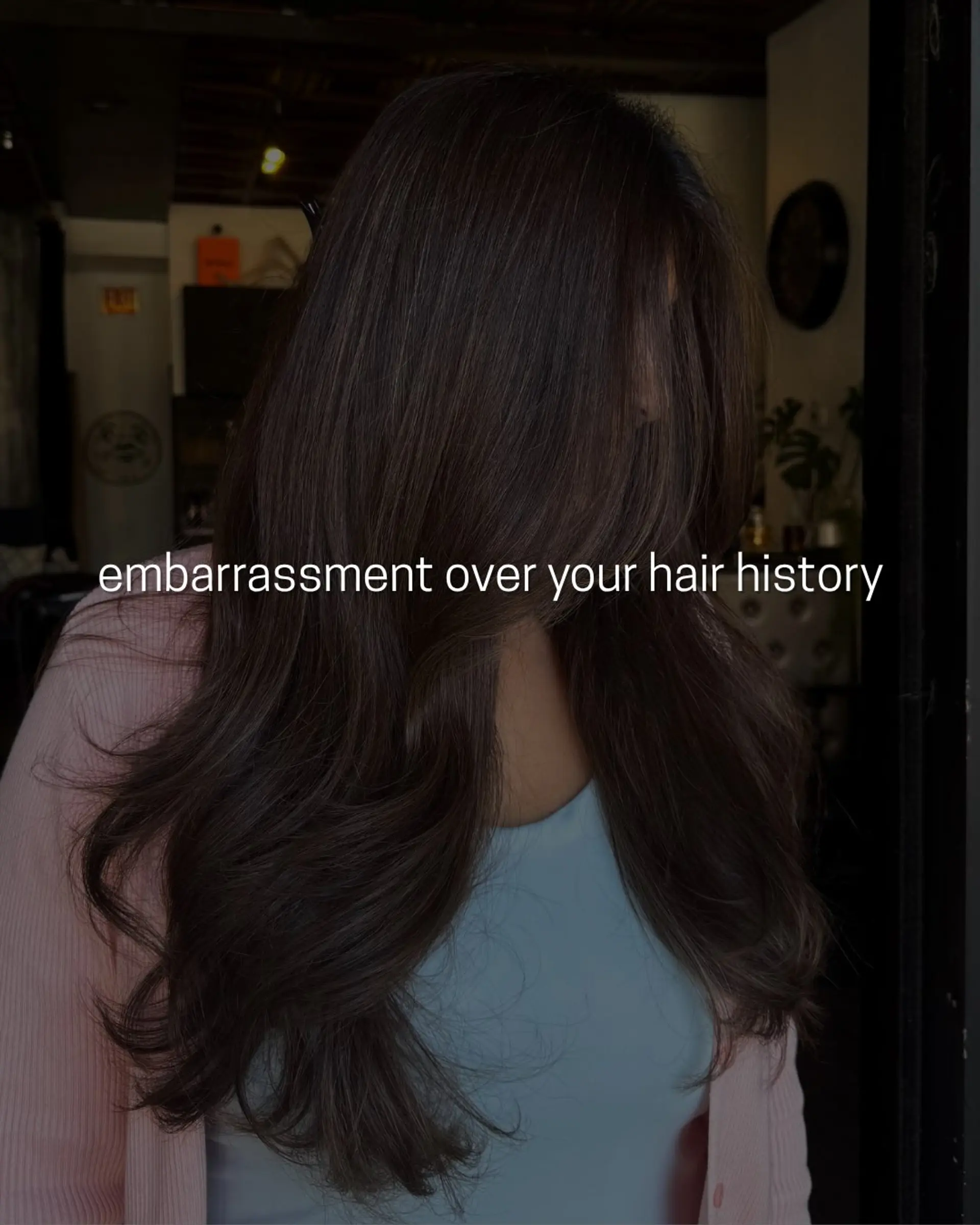 Long dark brown hair cut with soft face-framing layers and styled in a smooth, voluminous blowout with curled ends. 1