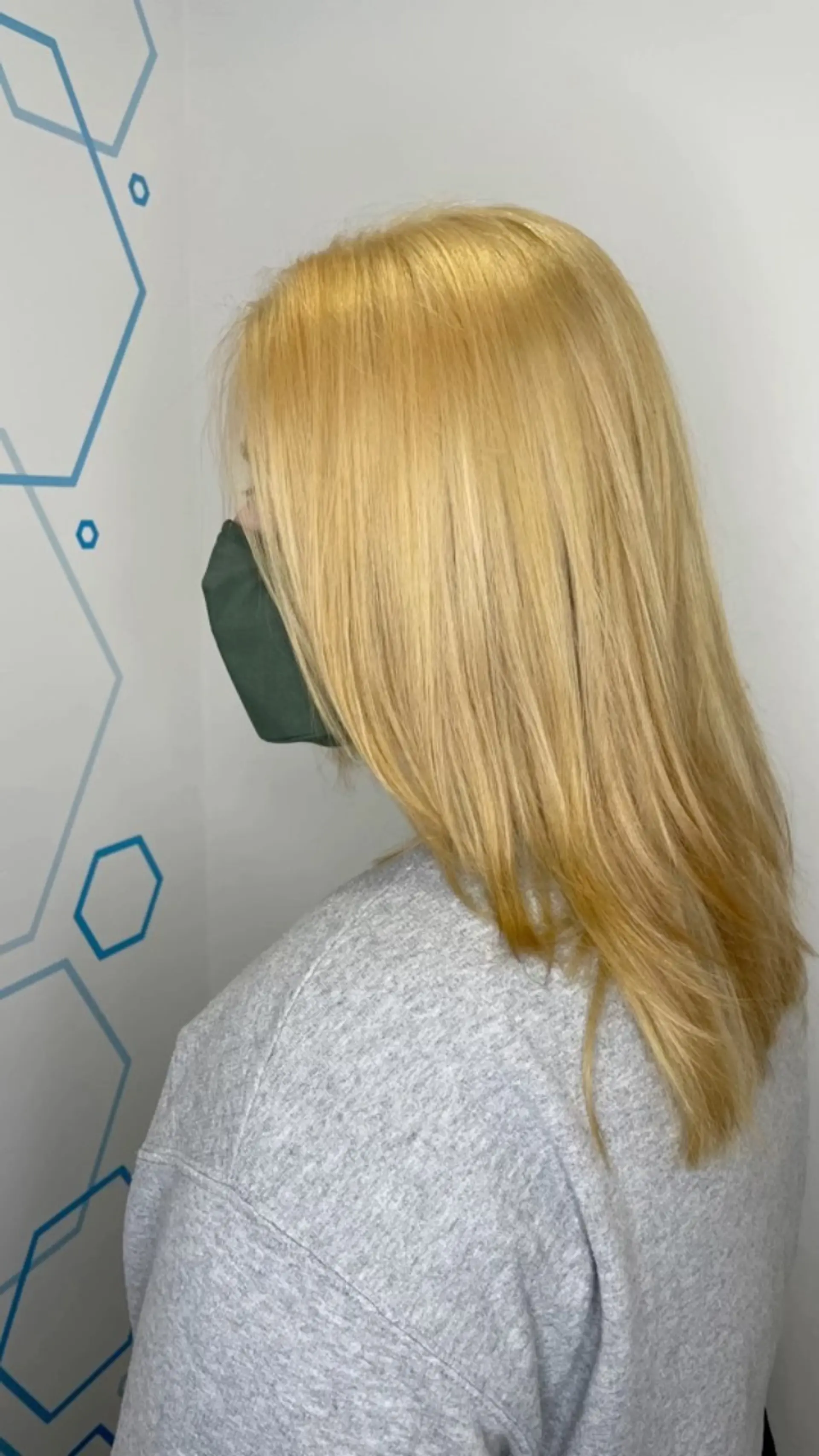 Medium-length straight hair styled in an even, warm golden blonde tone with light layered ends. 1