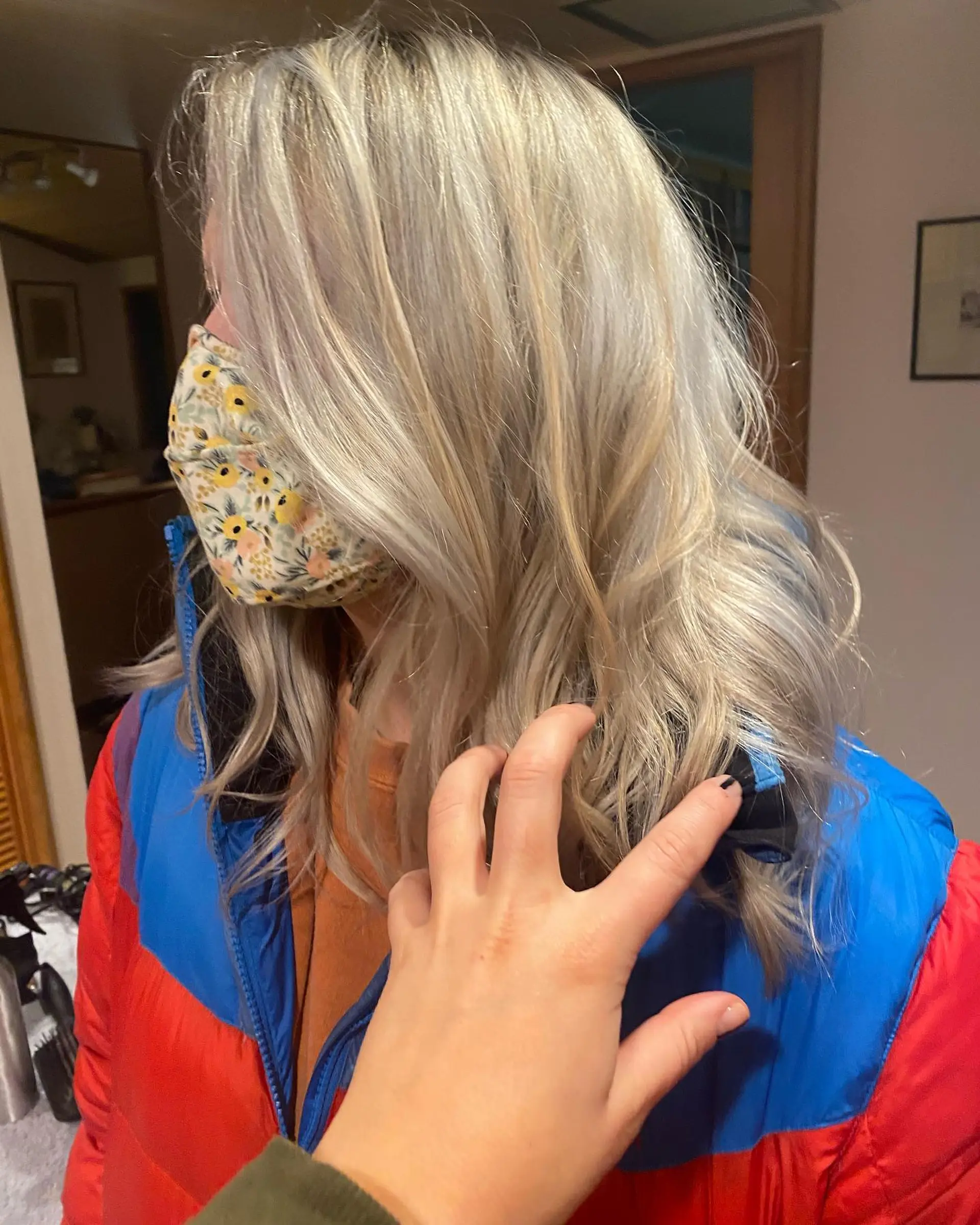 A cool, bright blonde foilyage with multi-dimensional platinum and ash tones, styled into soft textured waves. 1