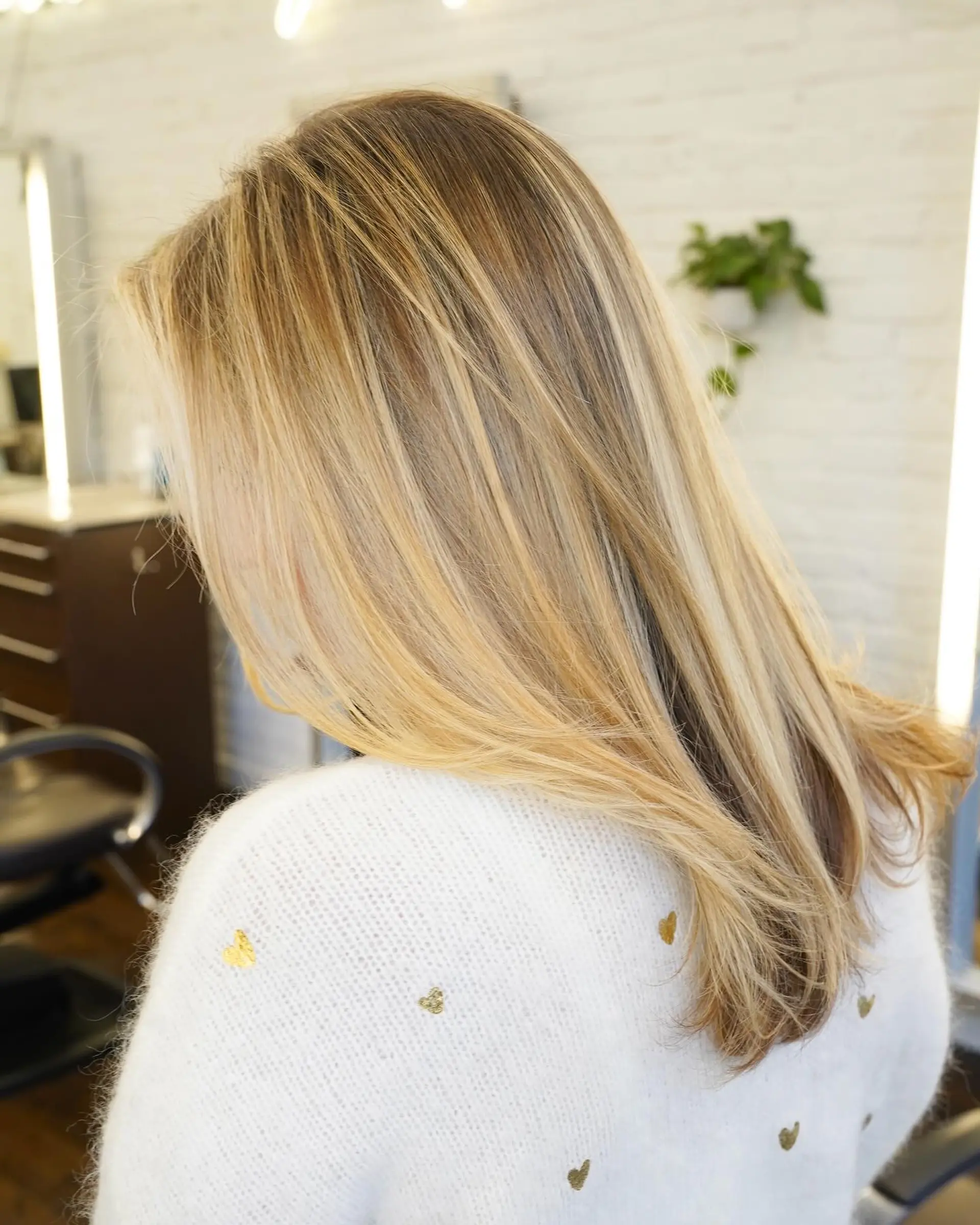 A bronde balayage with soft, dimensional layers for added movement. 1