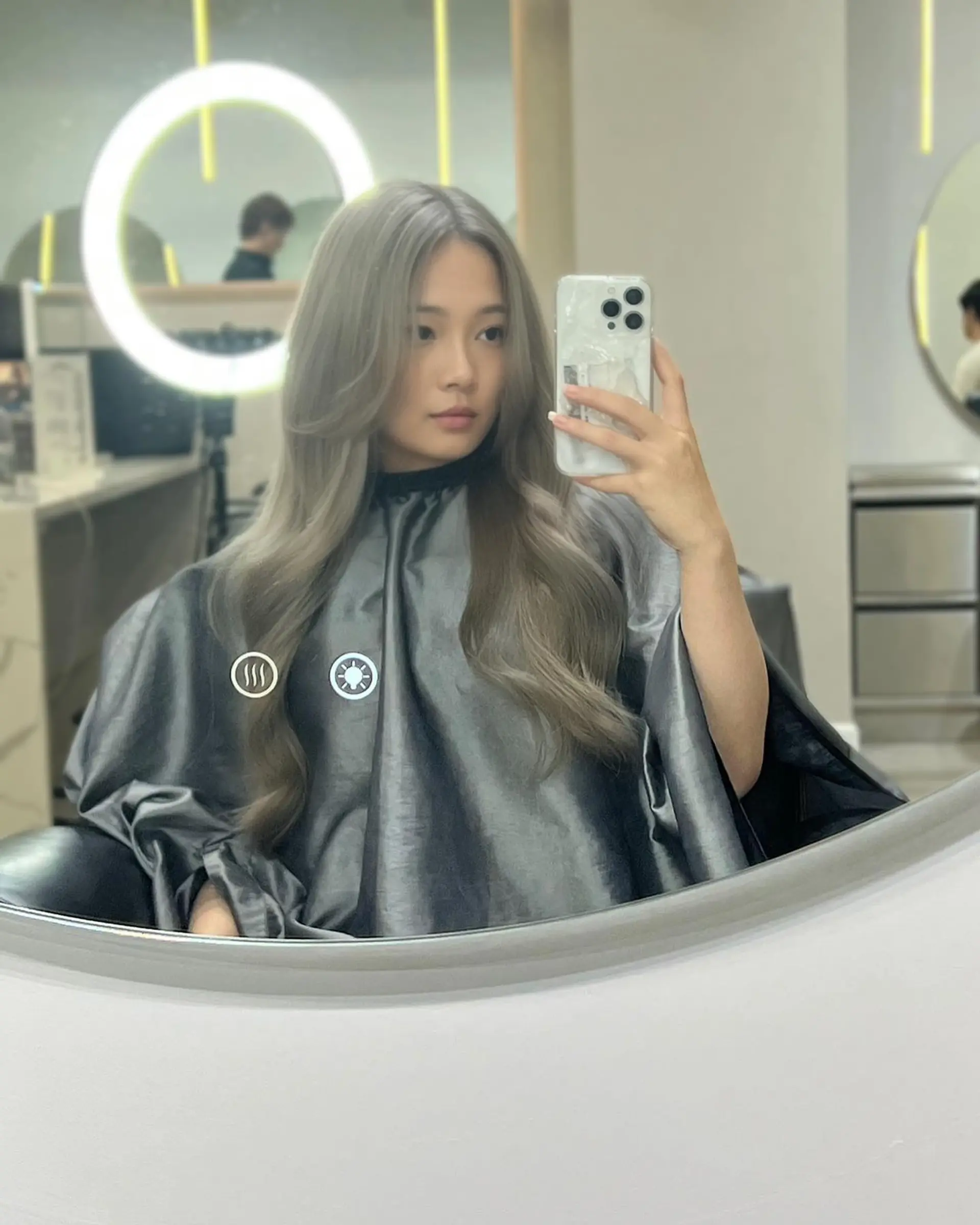 A trendy medium-length haircut with face-framing layers and soft waves. 1