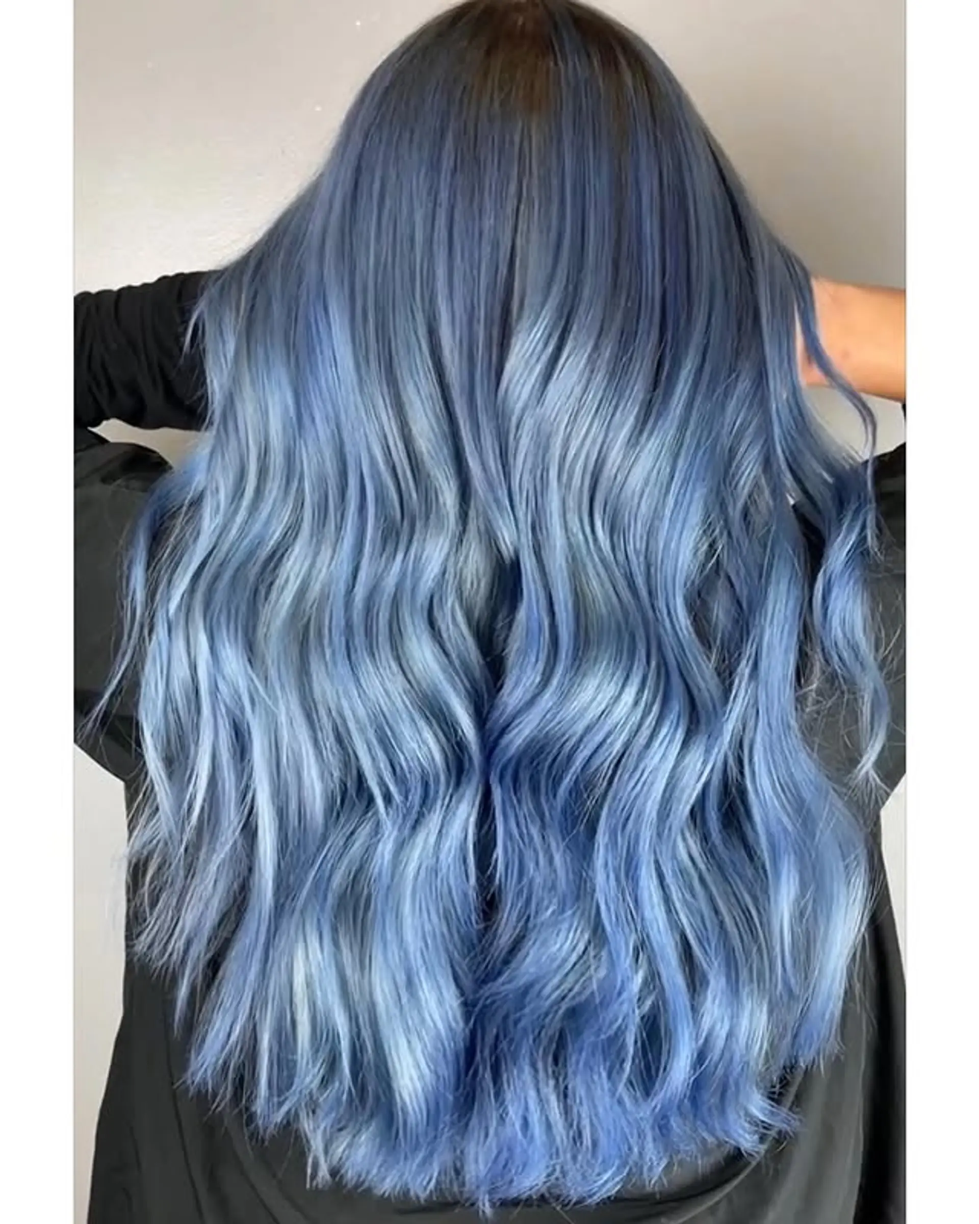 Long, wavy hair with a denim-inspired blue and silver color blend. 1