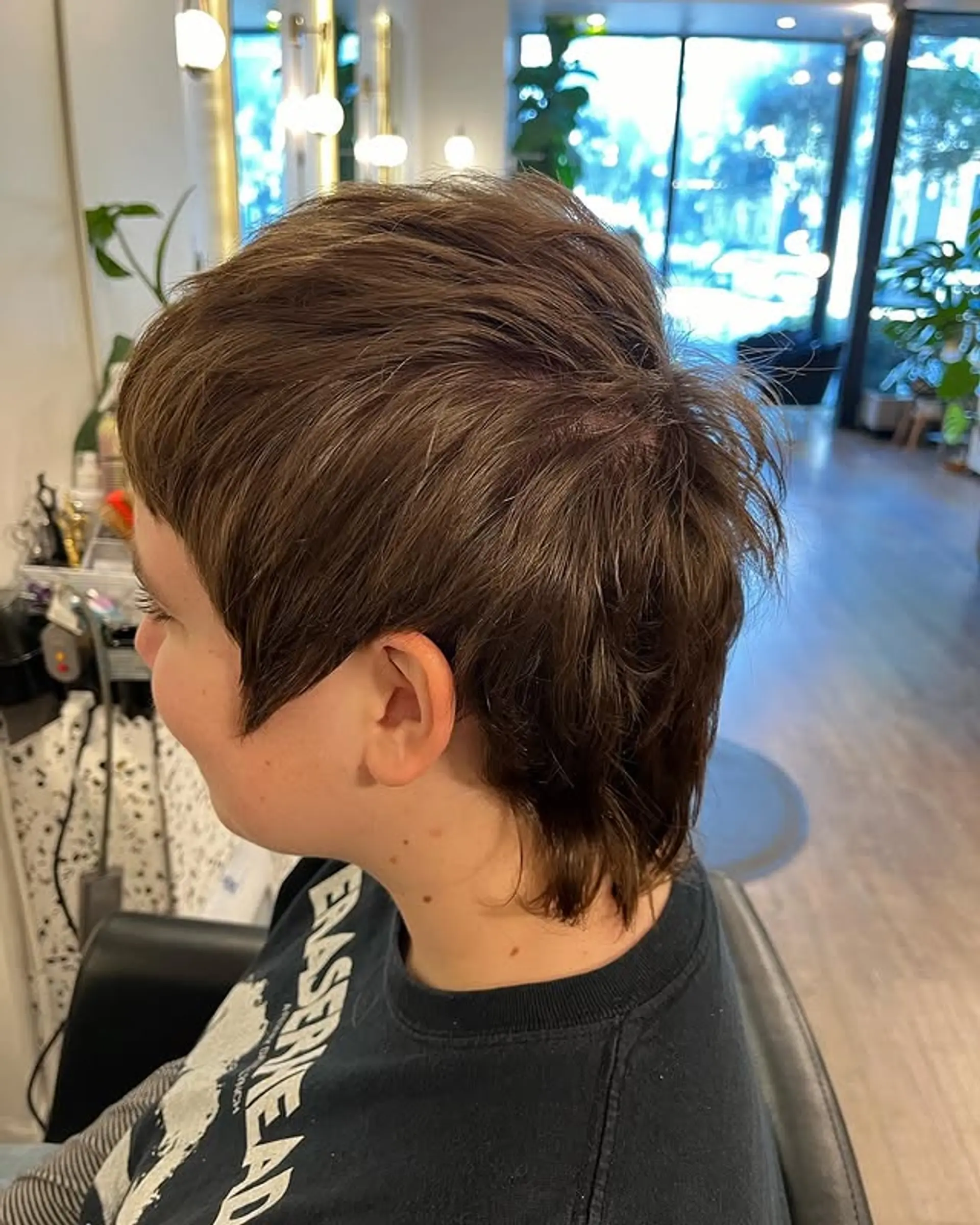 A modern take on the classic mullet with shaggy, textured layers for an edgy and stylish look. 1