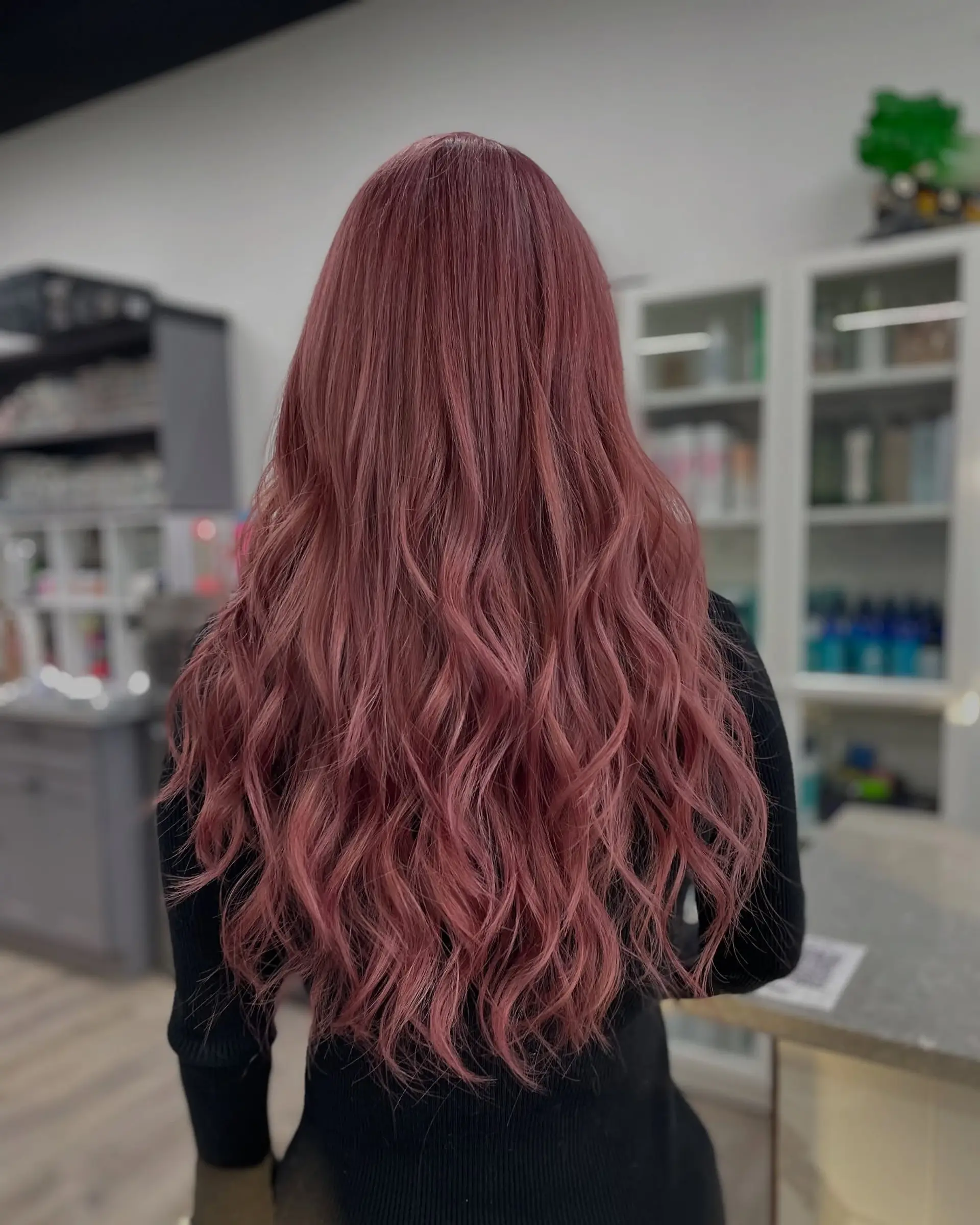 Long, flowing waves with a vibrant rose gold hue. 1