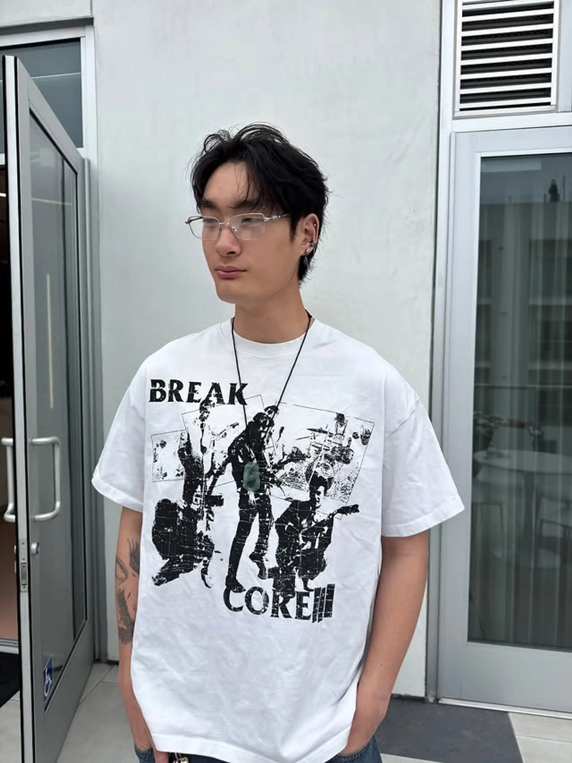 Medium-length wavy hair with soft layers, parted in the center for a relaxed and stylish look. 1