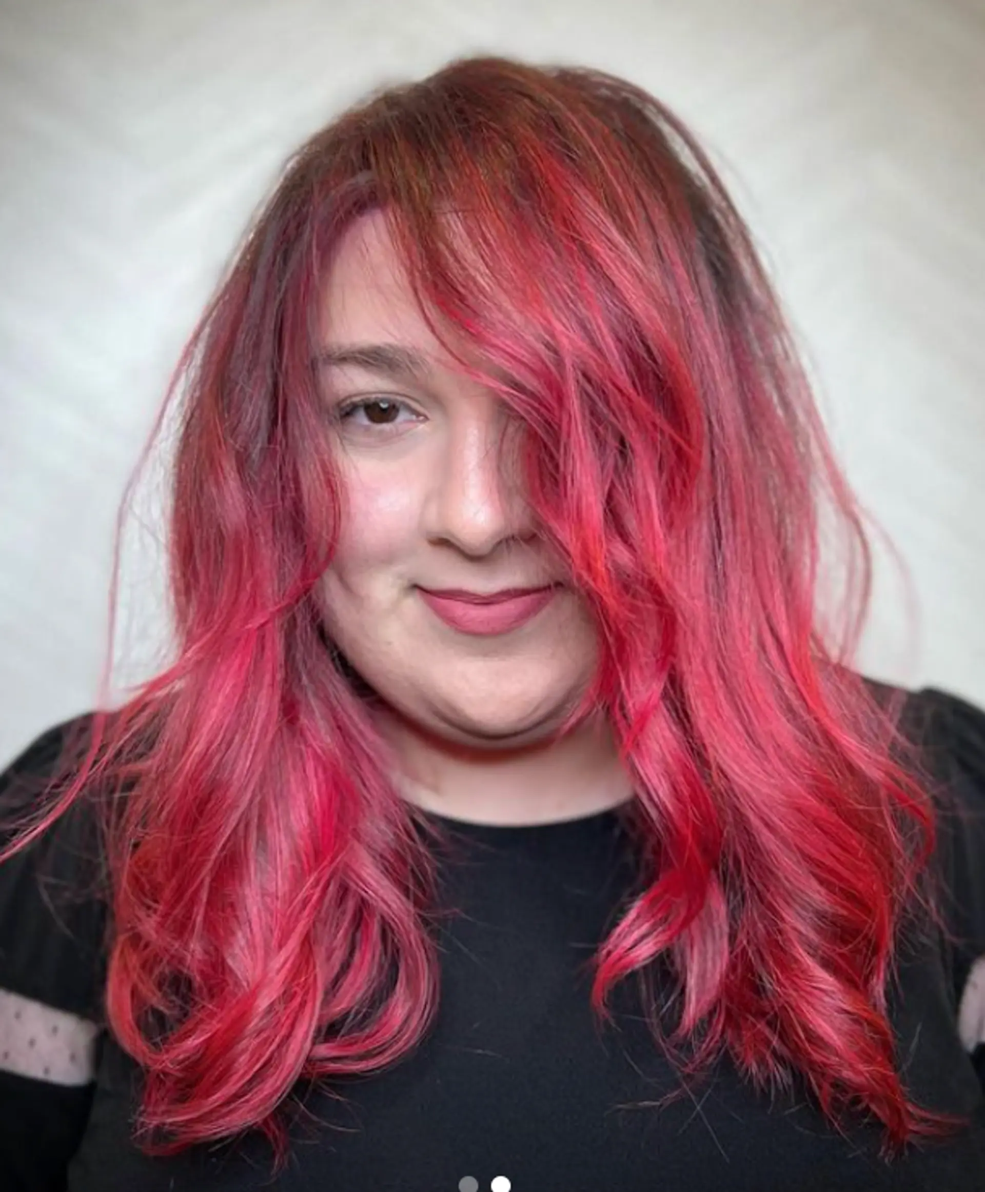 Long, wavy, vibrant red hair with soft layers and side part.

Color by @simabeautynyc
Cut and style by @juliamannino_hair
 2