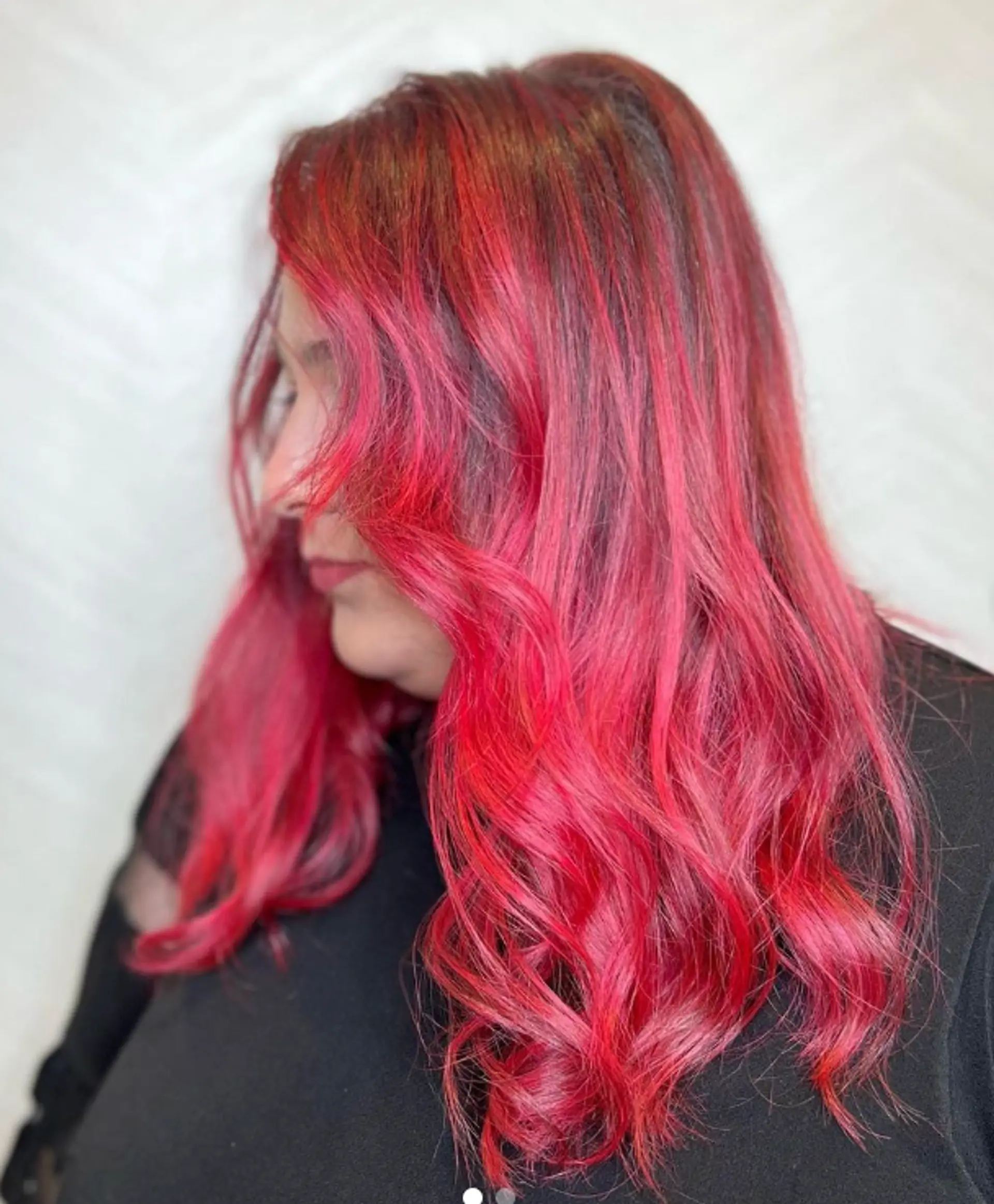 Long, wavy, vibrant red hair with soft layers and side part.

Color by @simabeautynyc
Cut and style by @juliamannino_hair
 1