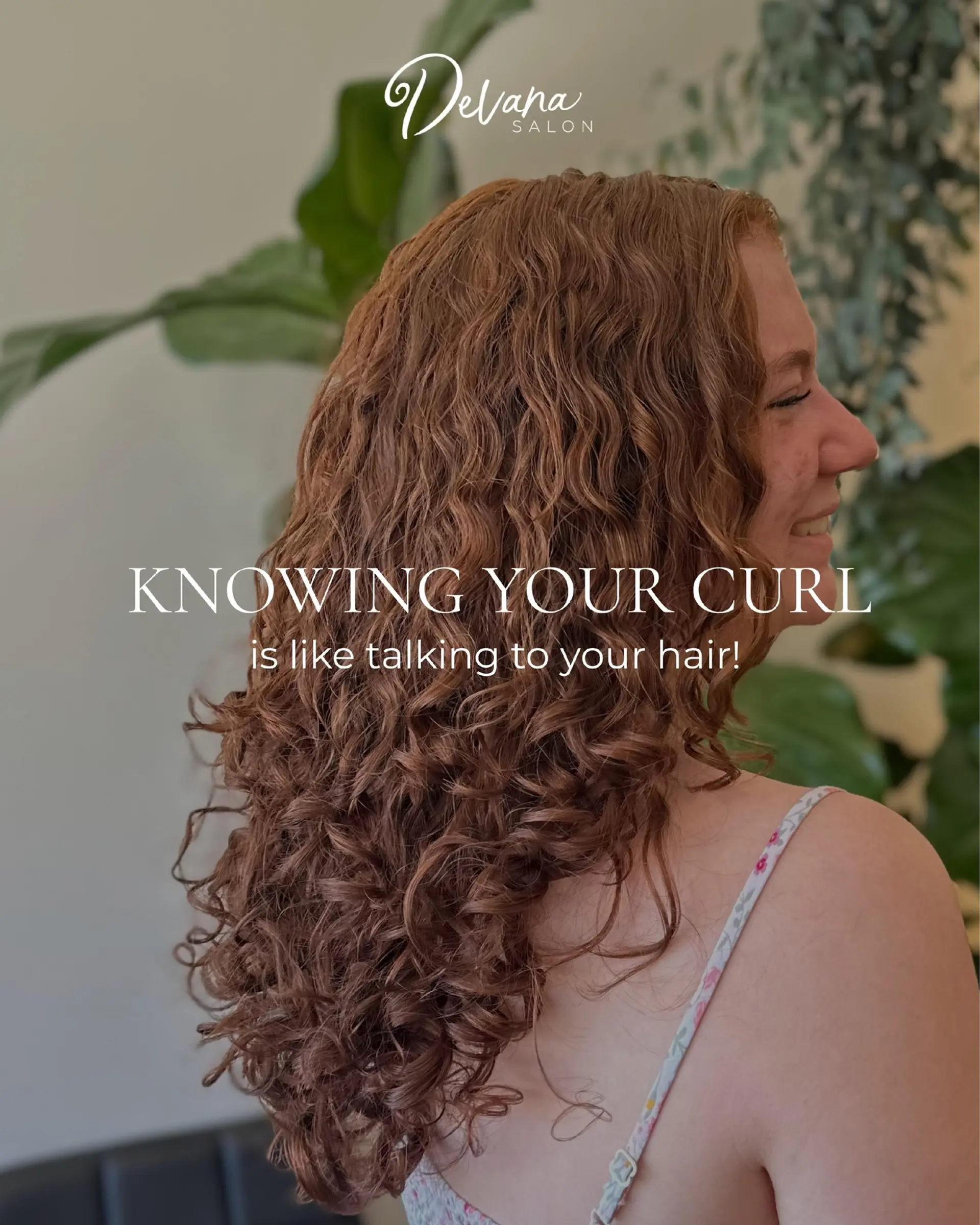 Long cascading reddish-brown hair cut into defined, bouncy spiral curls with volume and textured layering. 1