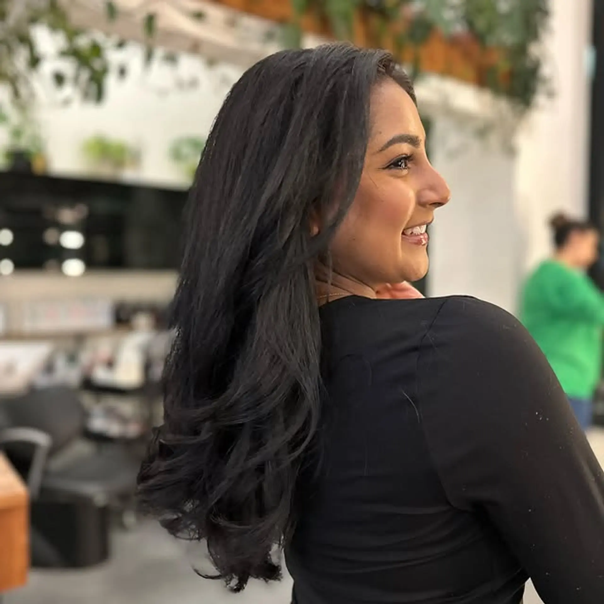 A long, wavy hairstyle with layers for added volume and movement. 1