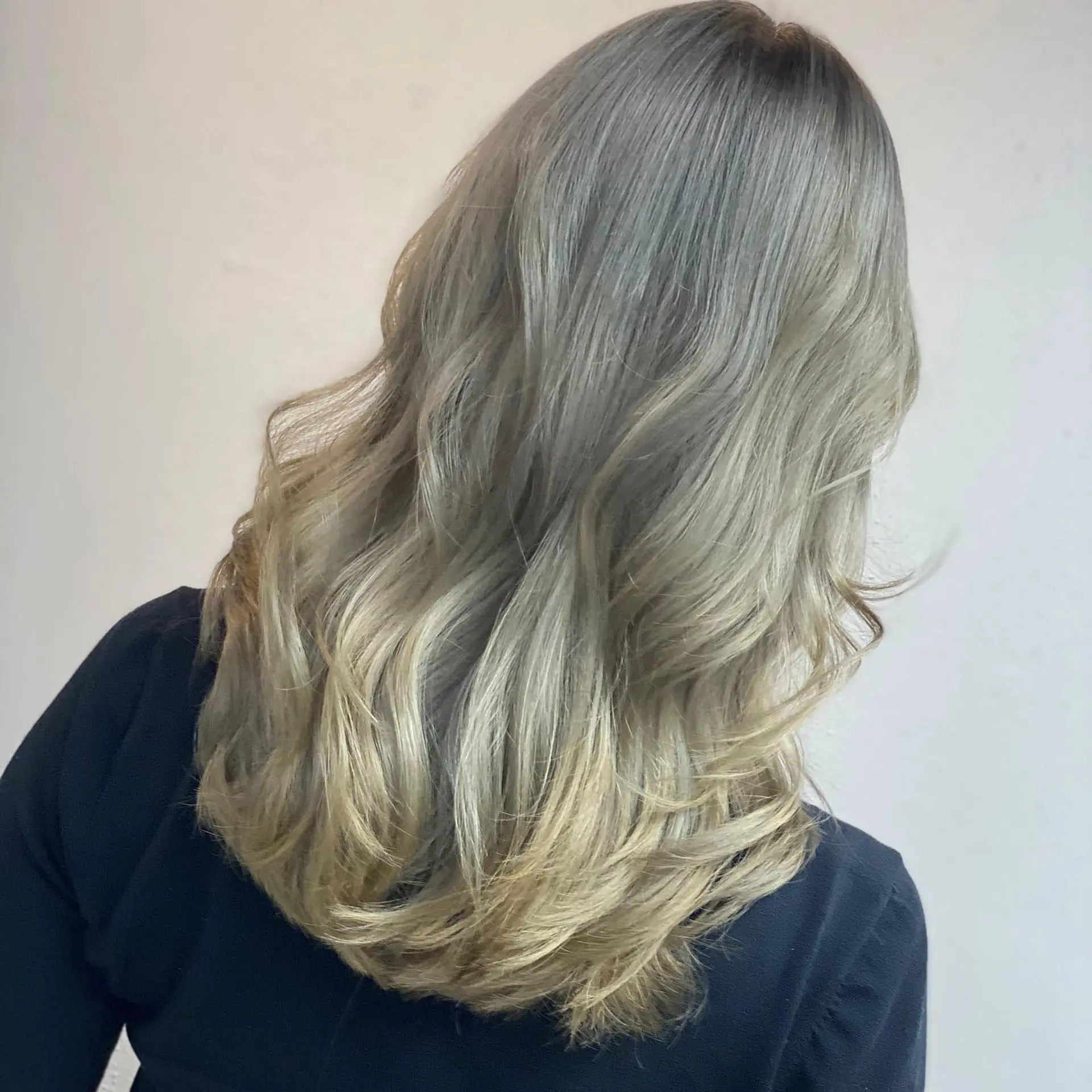 Long, layered waves with a stunning silver blonde ombre. 1