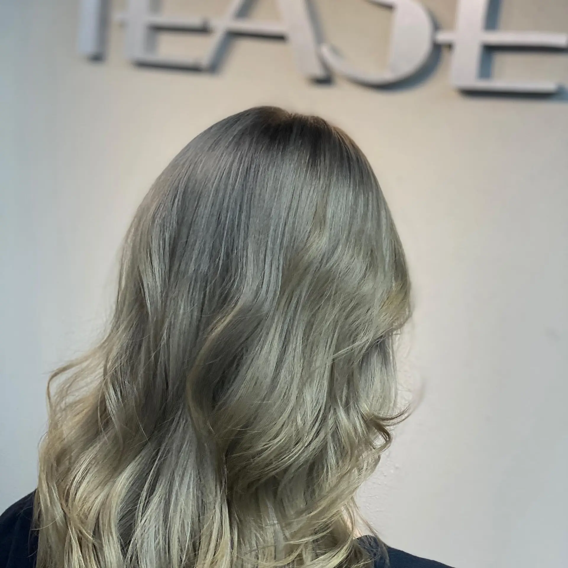 Long, layered waves with a stunning silver blonde ombre. 3