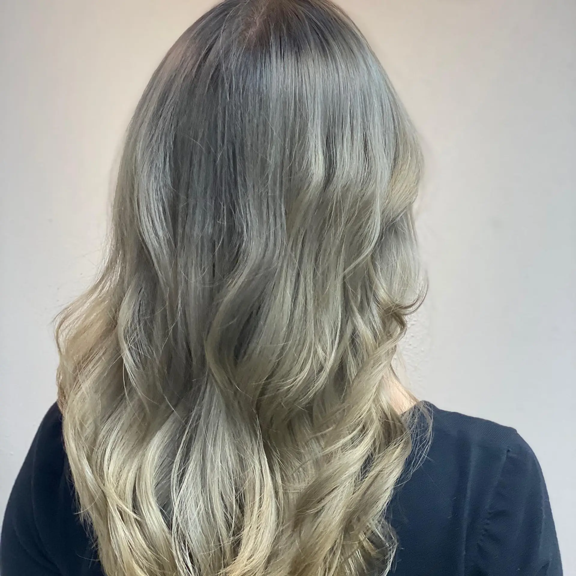 Long, layered waves with a stunning silver blonde ombre. 4