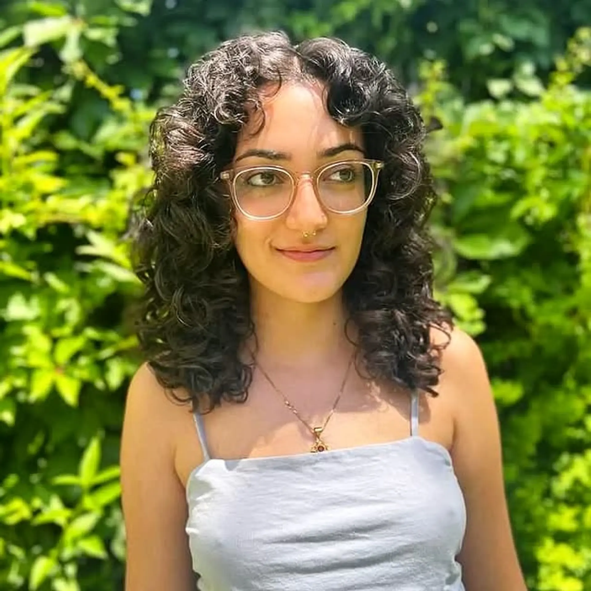 A curly shag with face-framing layers provides volume and enhances natural curls. 1