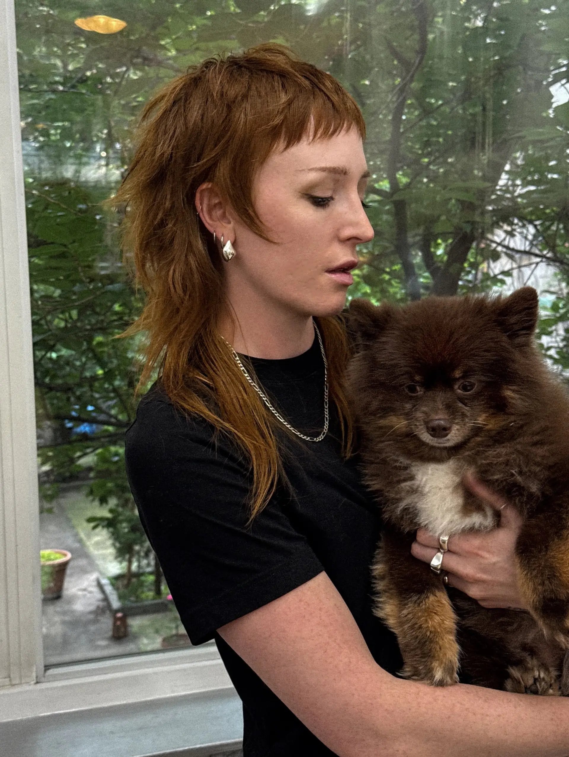 A shaggy mullet with short, choppy micro bangs. The style is heavily layered for texture and movement. 1