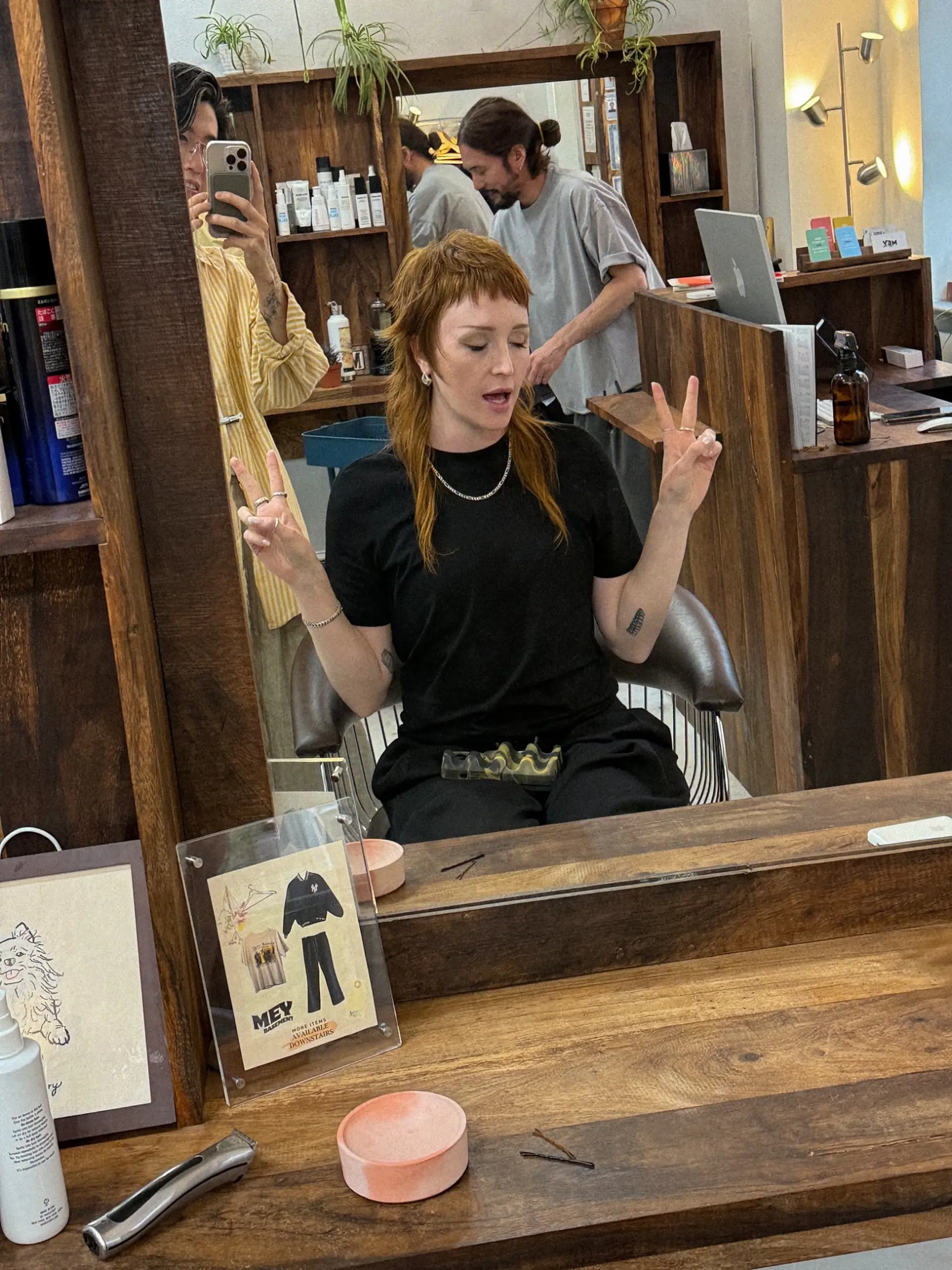 A shaggy mullet with short, choppy micro bangs. The style is heavily layered for texture and movement. 5