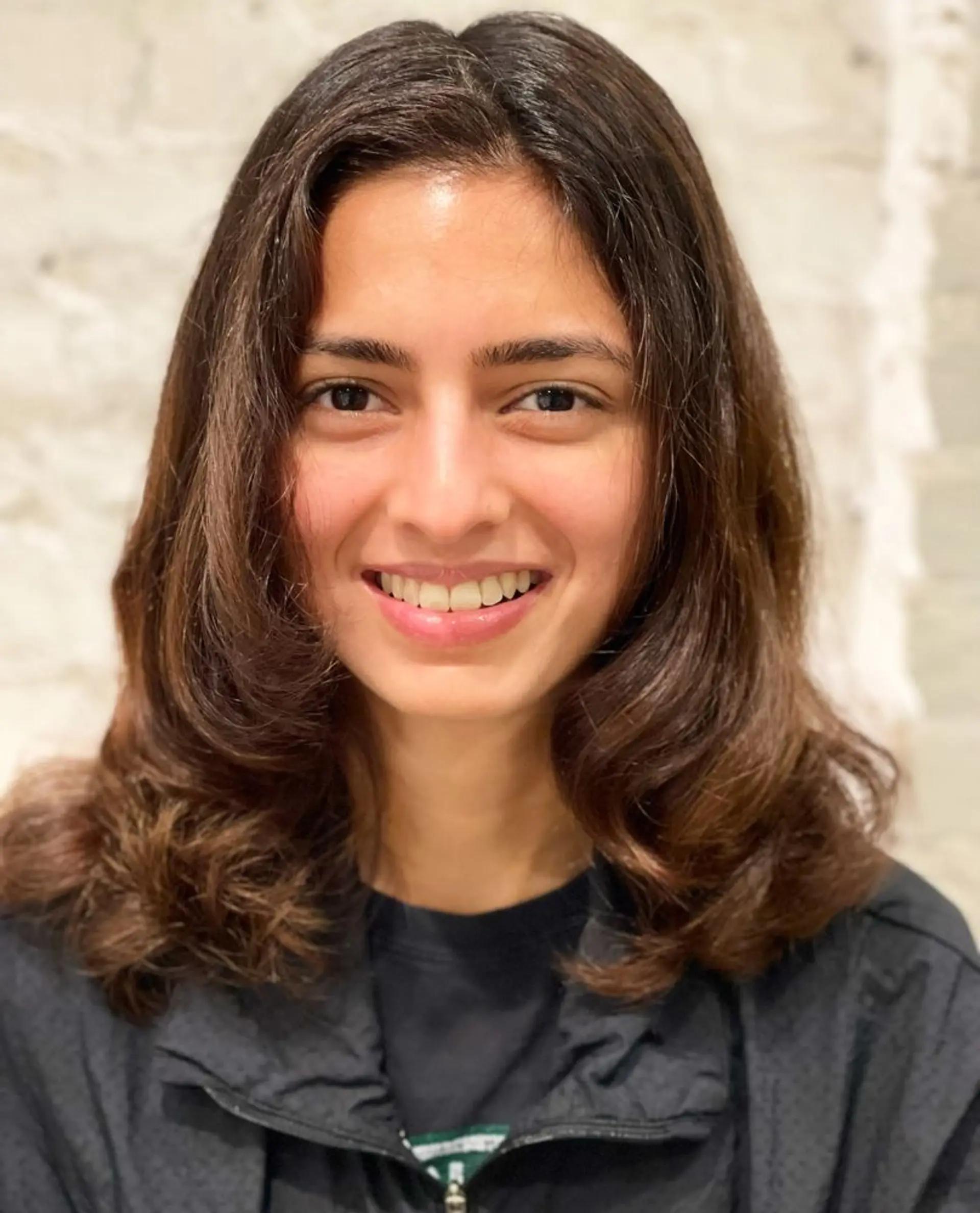 A medium-length haircut with soft, face-framing layers. 1