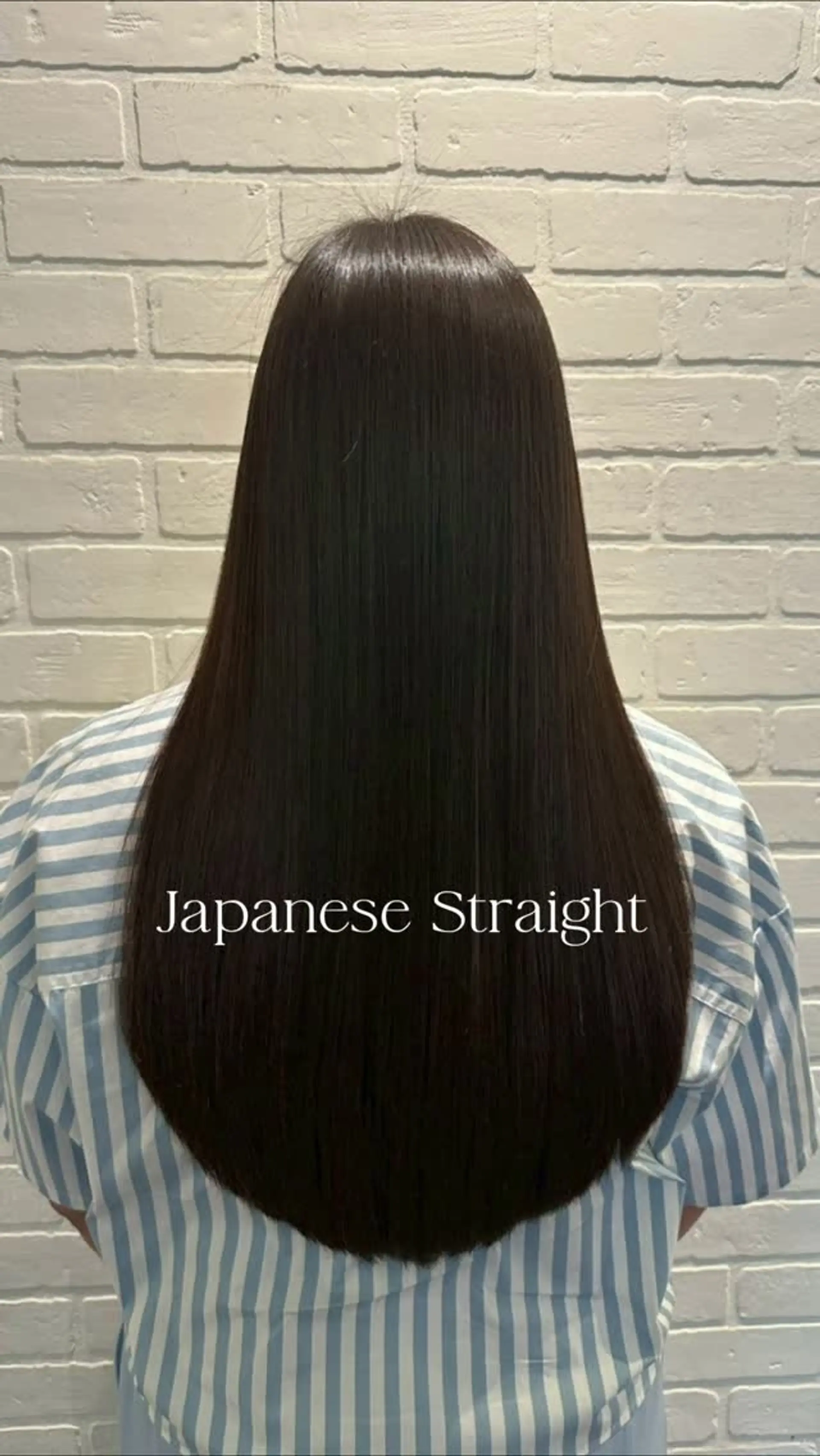 Ultra-sleek, pin-straight long hair with a smooth, glossy finish and a curved U-shaped hemline. 1