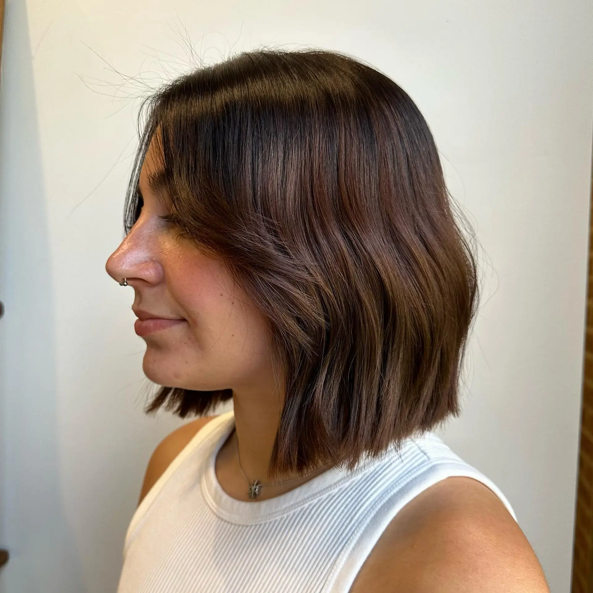 A wavy layered bob with face-framing layers. 1