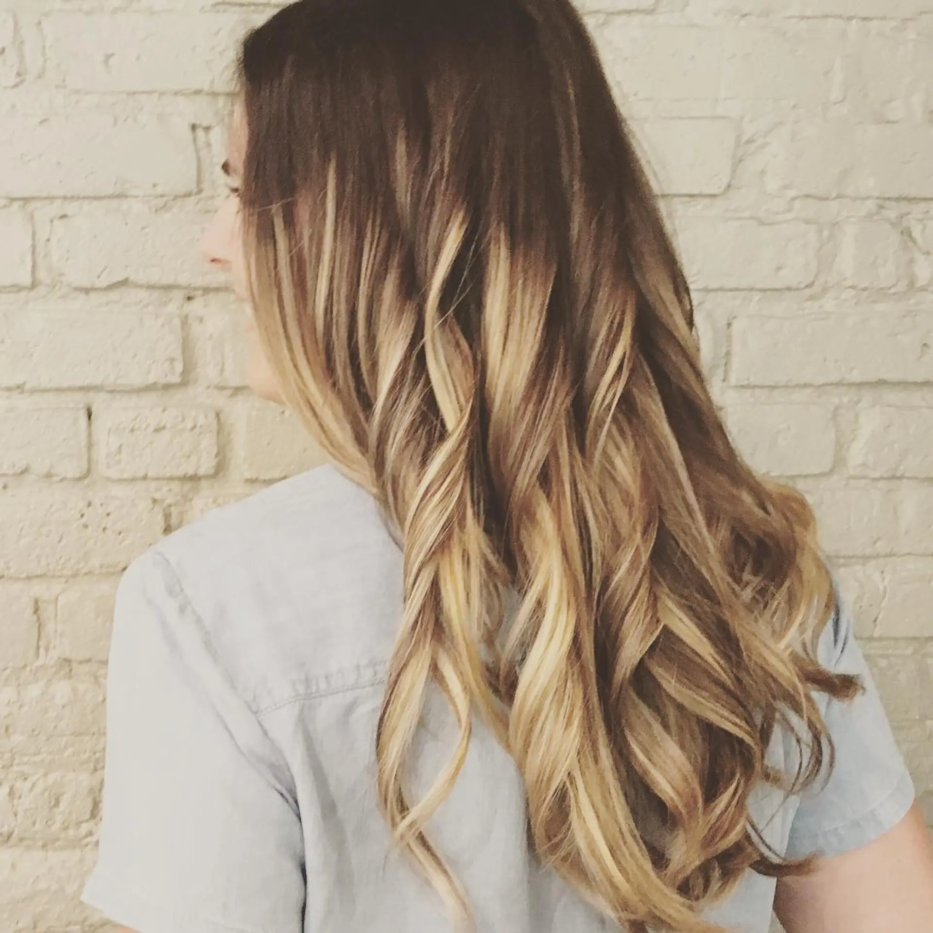 Long, wavy hair with a caramel swirl balayage. 1